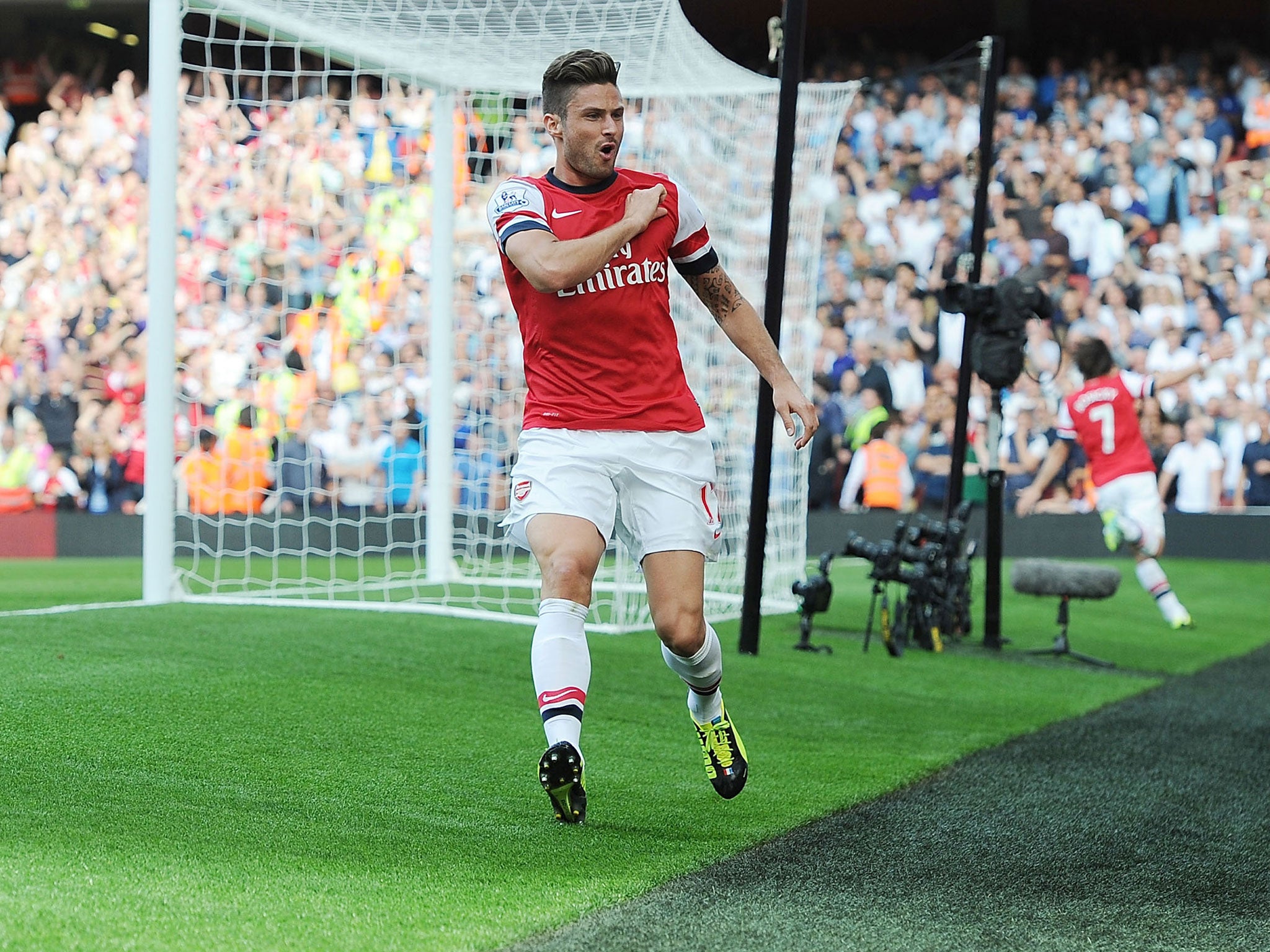 Olivier Giroud celebrates scoring for Arsenal