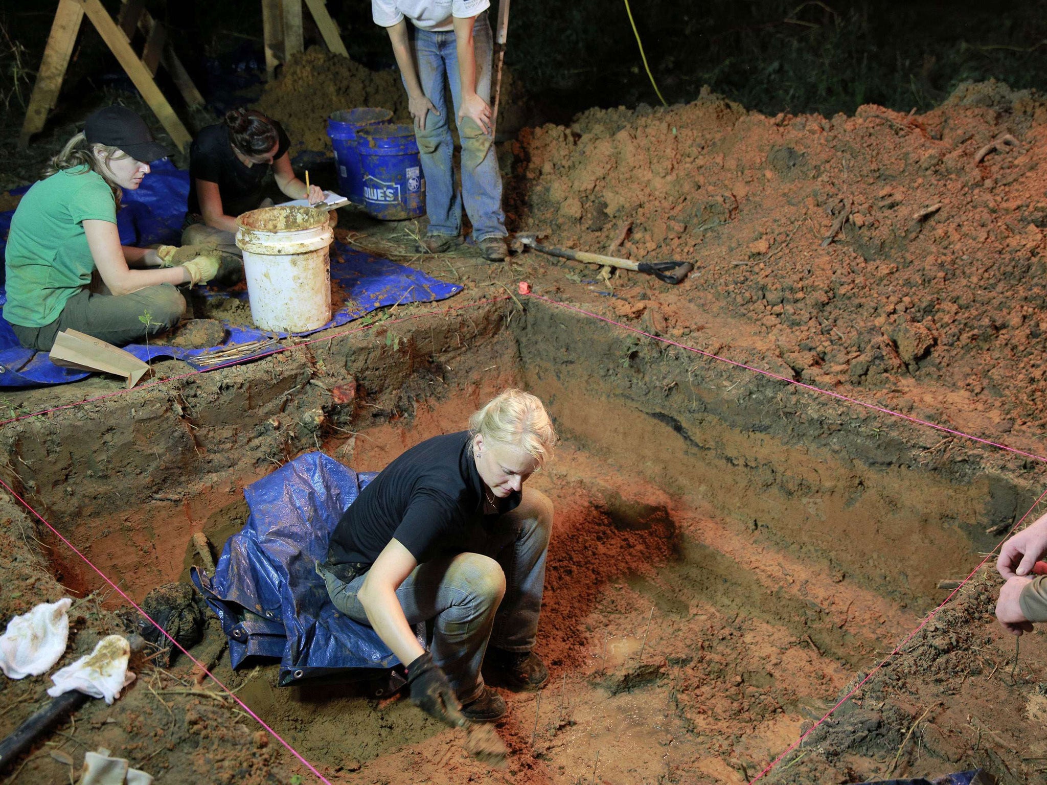 Dr. Erin Kimmerle exhumes a grave at the Boot Hill cemetery