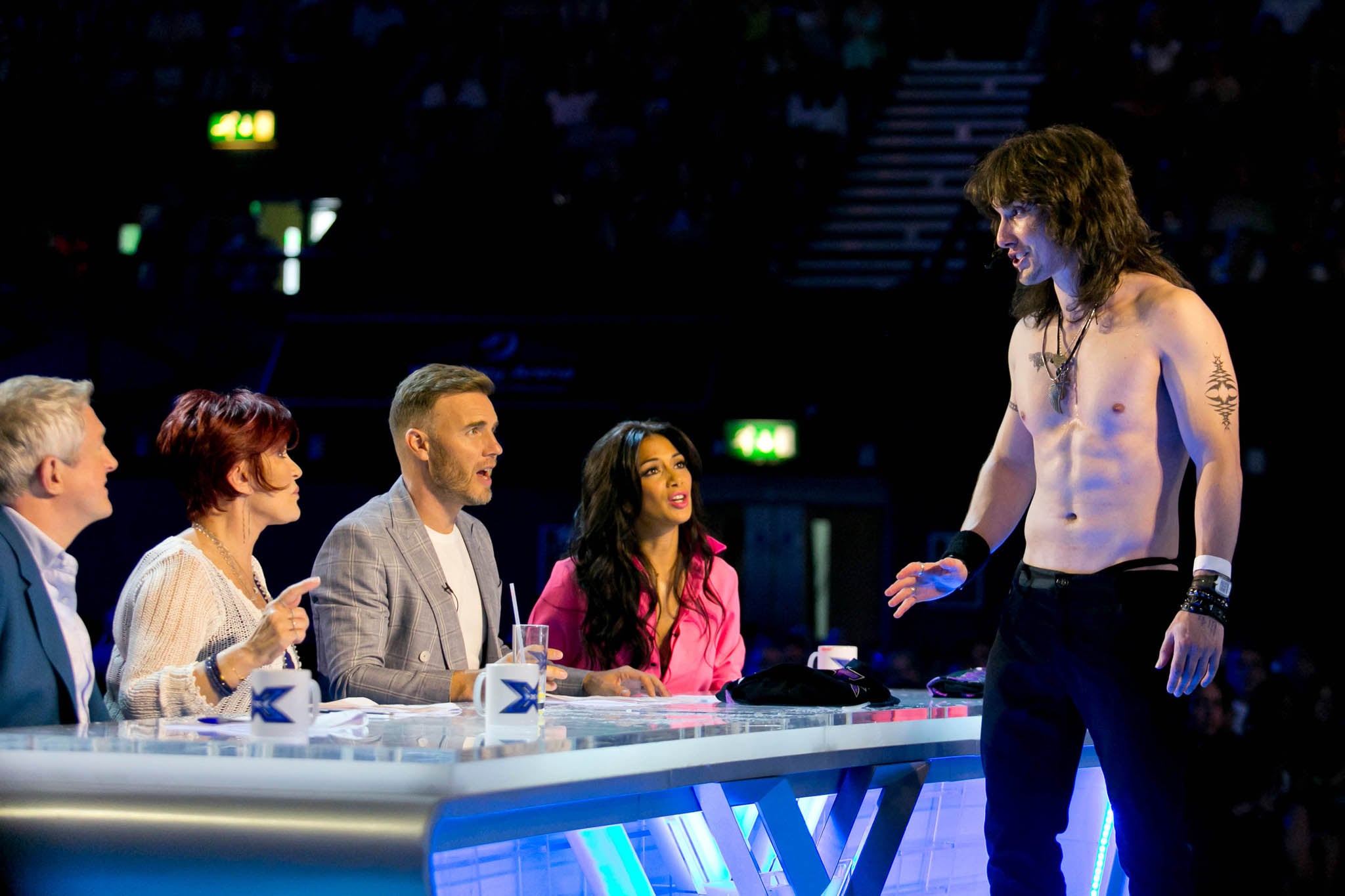 The X Factor judges: Louis Walsh, Sharon Osbourne, Gary Barlow and Nicole Scherzinger