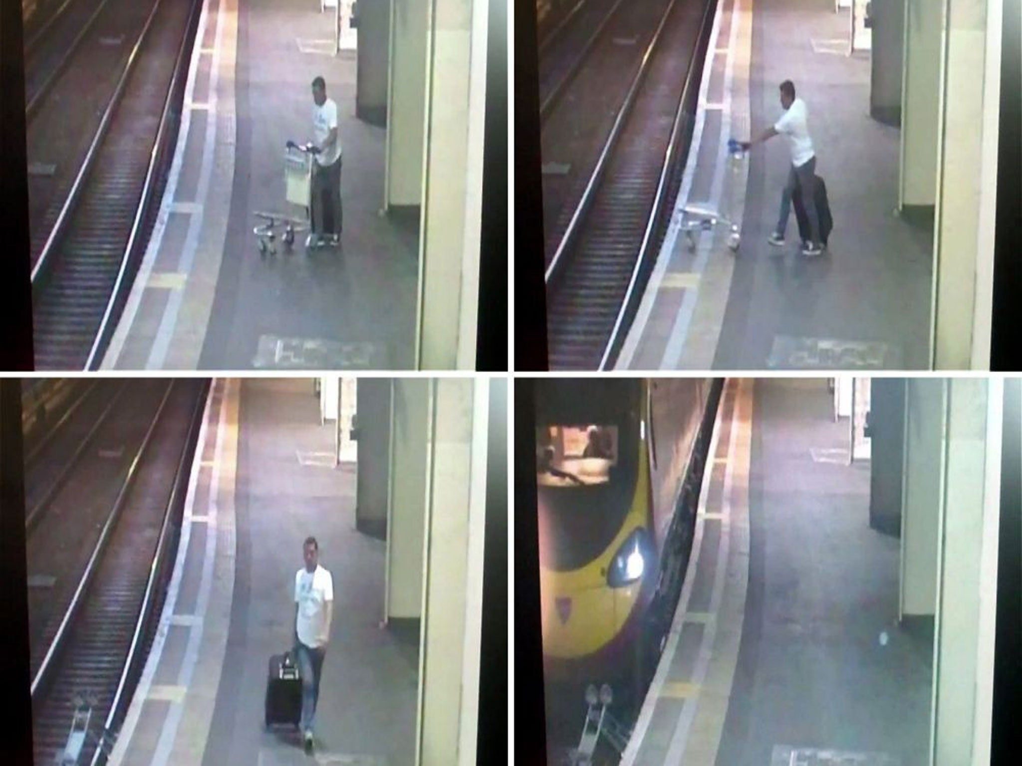 Handout CCTV grabs issued by British Transport Police of a man pushing a suitcase trolley onto the tracks at Euston station in London.