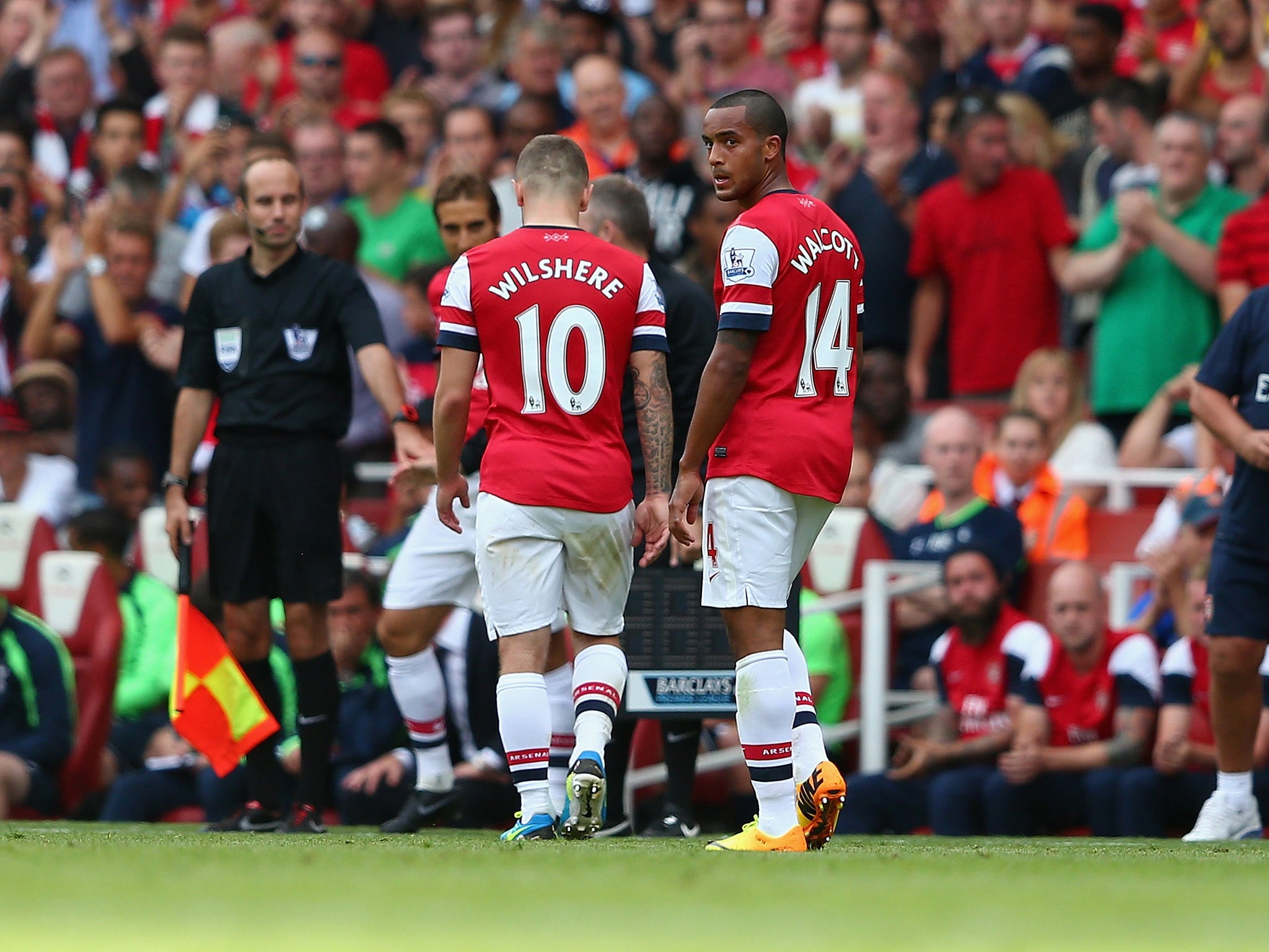 Jack Wilshere leaves the field during the derby against Tottenham