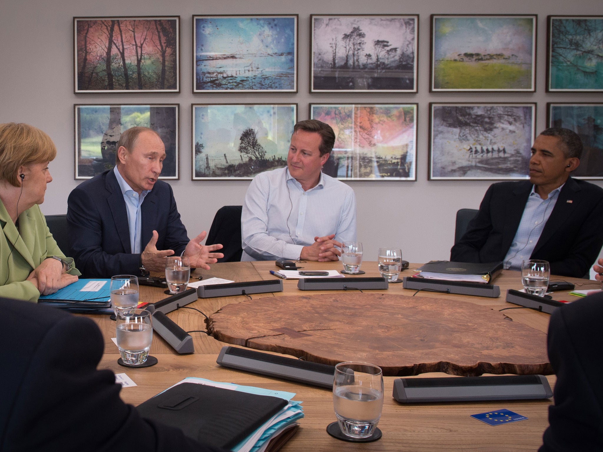 Germany's Chancellor Angela Merkel, Russia's President Vladimir Putin, Britain's Prime Minister David Cameron and US President Barack Obama on June 18, 2013.