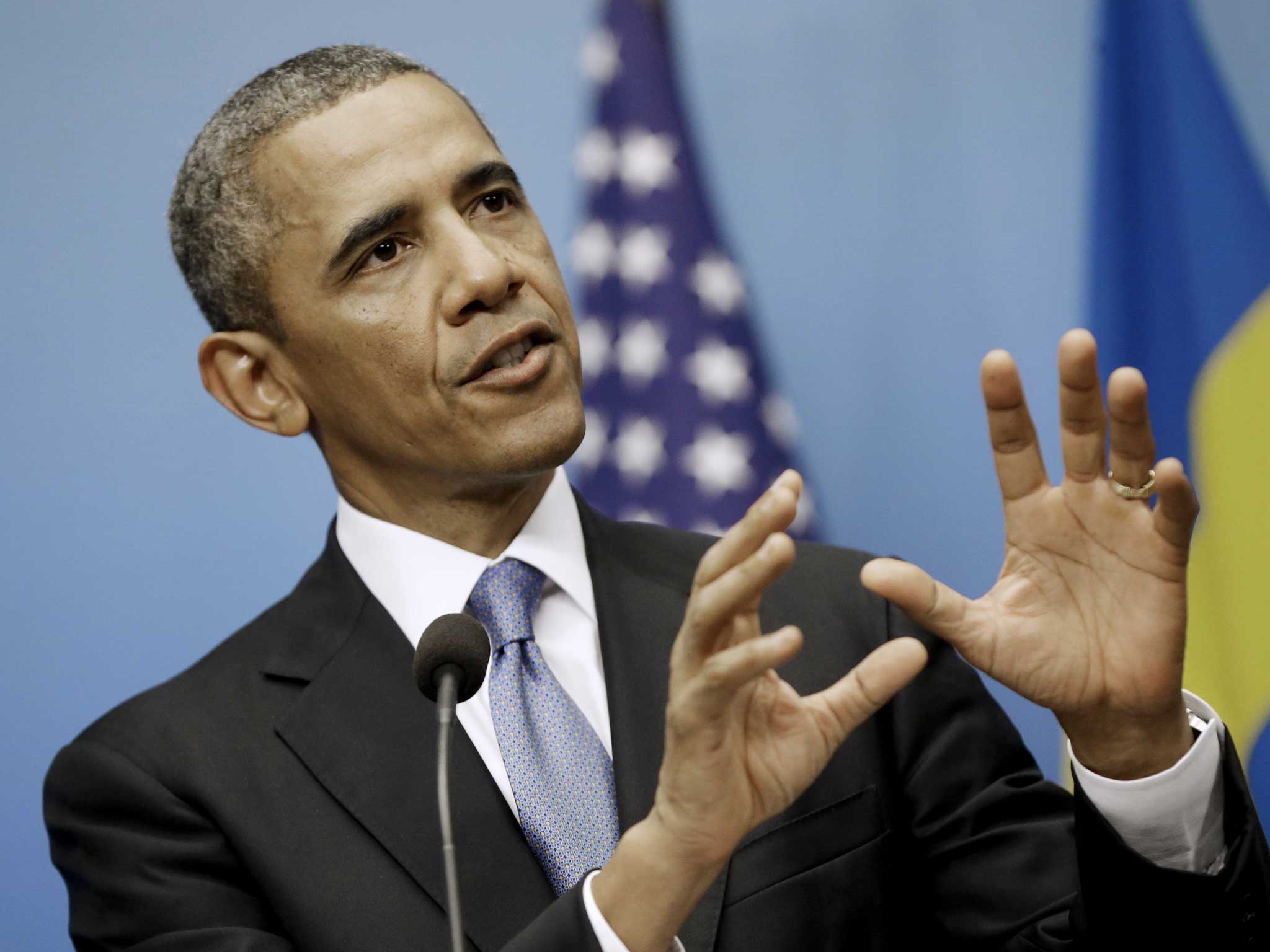 Barack Obama answers questions during a joint news conference with Swedish Prime Minister Fredrik Reinfeldt