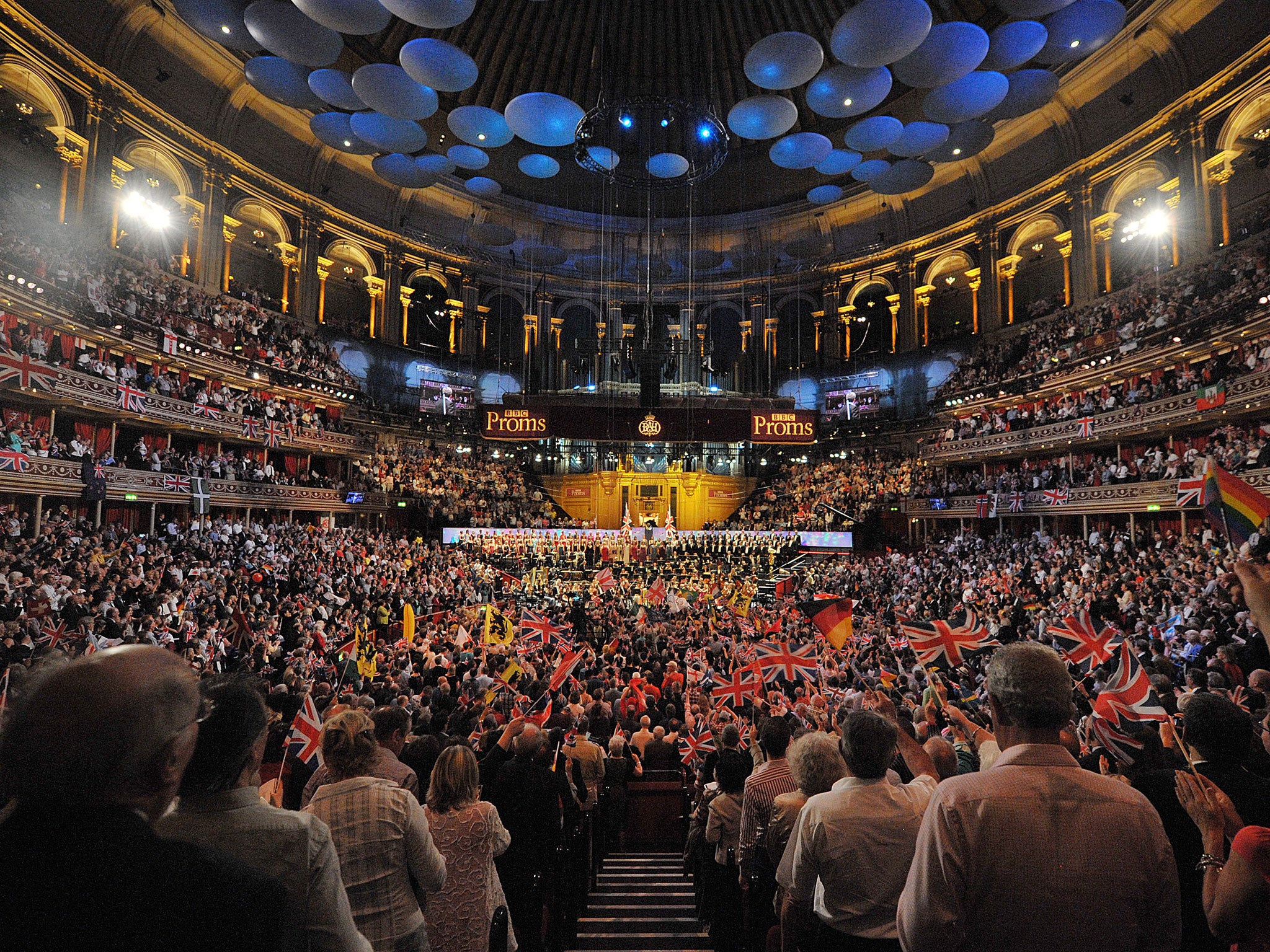 Patriotic revellers wave flags at the Royal Albert Hall in west London on September 10, 2011