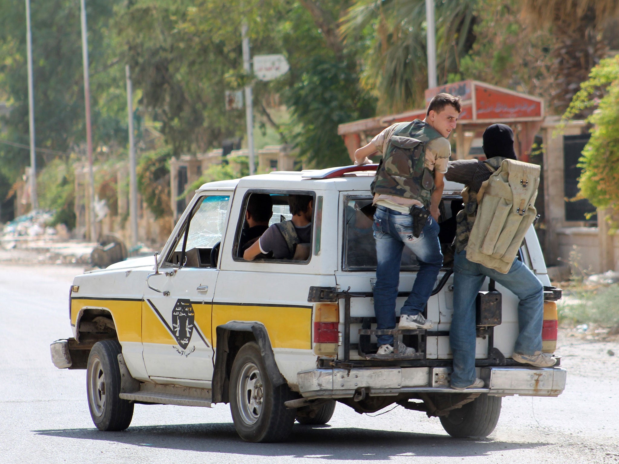 Rebels from the Islamist group the 'Redeemers of Islam' in the town of Deir Ezzor