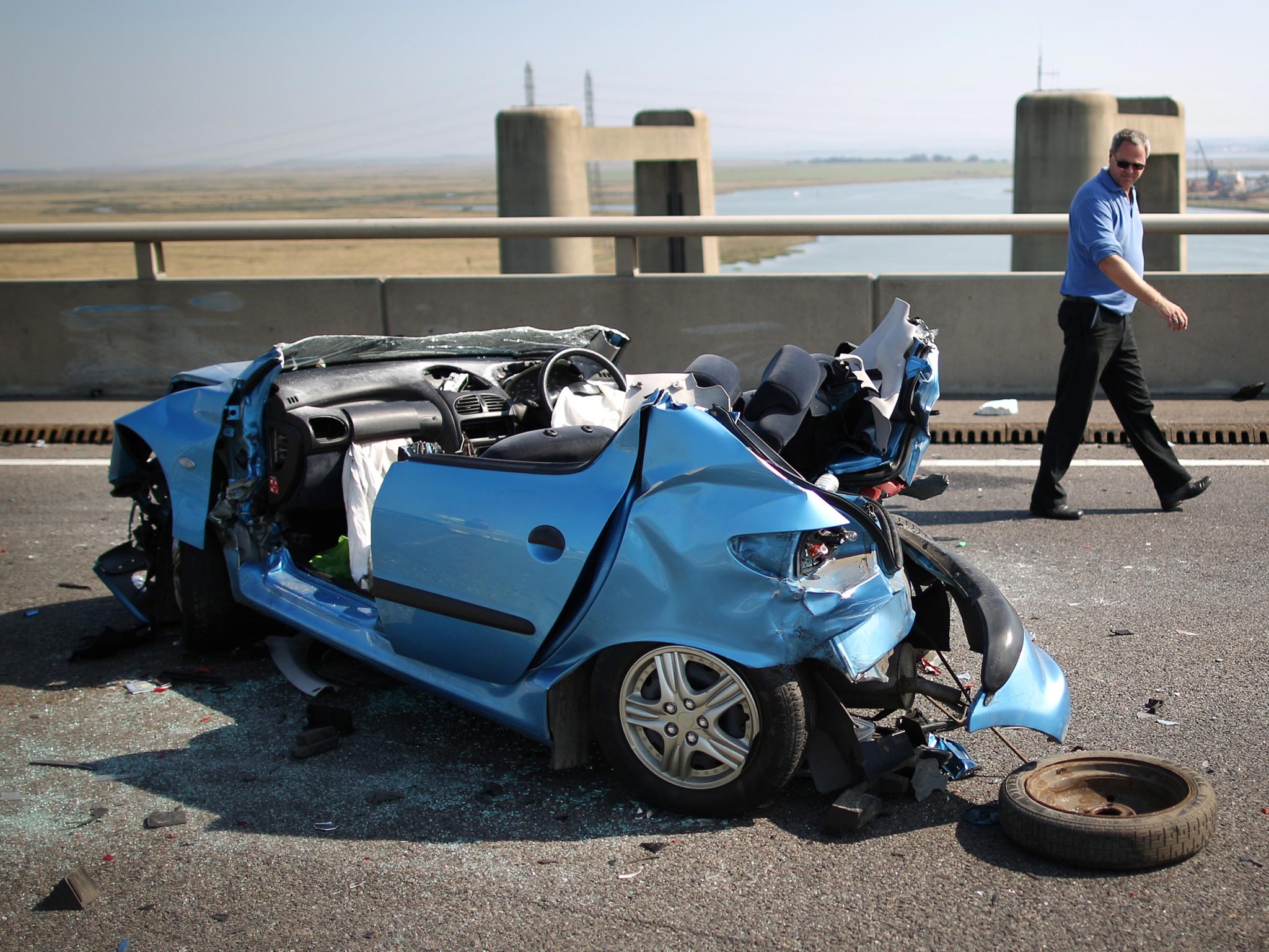 The remains of a car involved in the accident on the A249