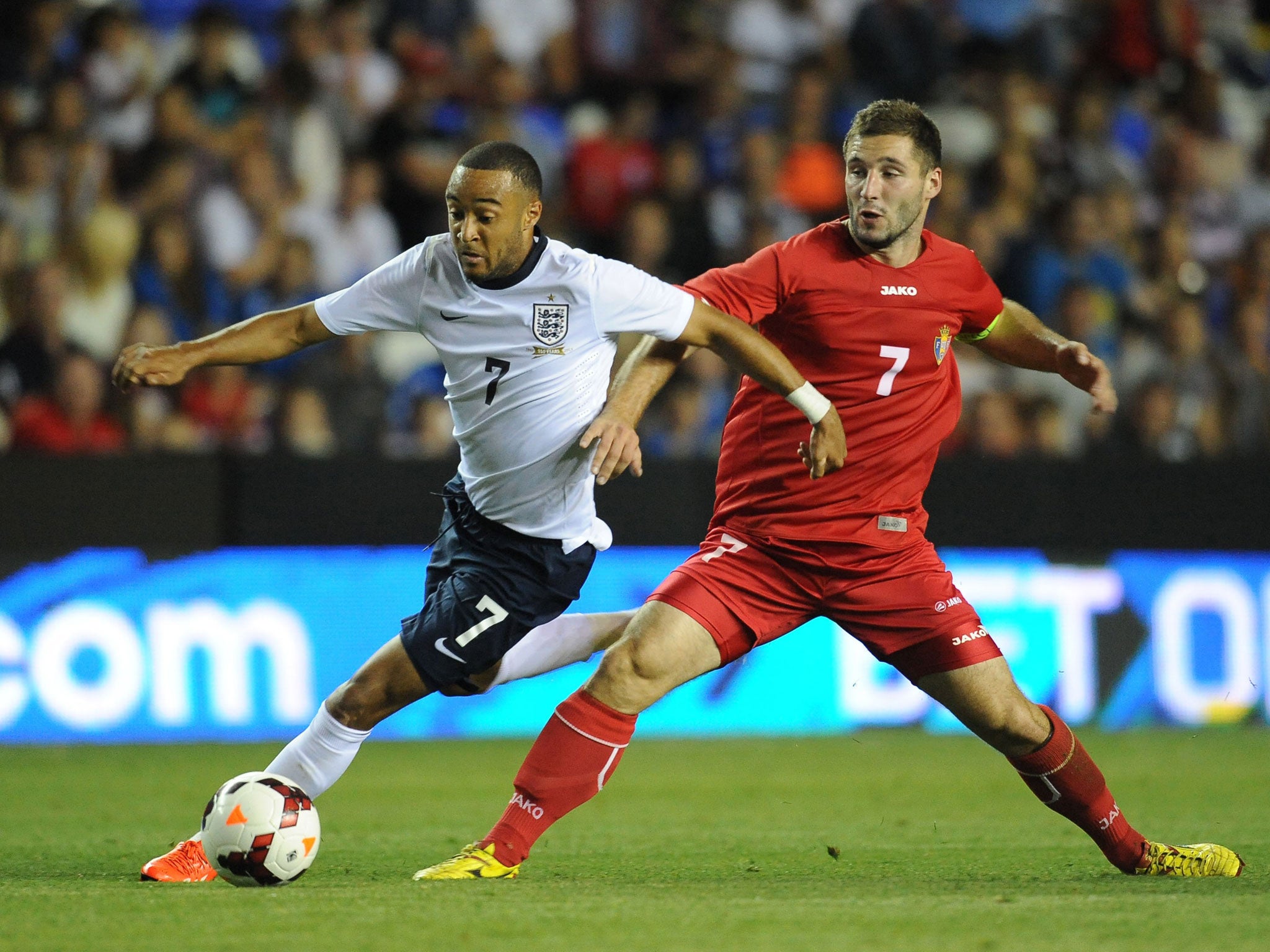 Nathan Redmond and Eugen Zasaviitchi battle for the ball