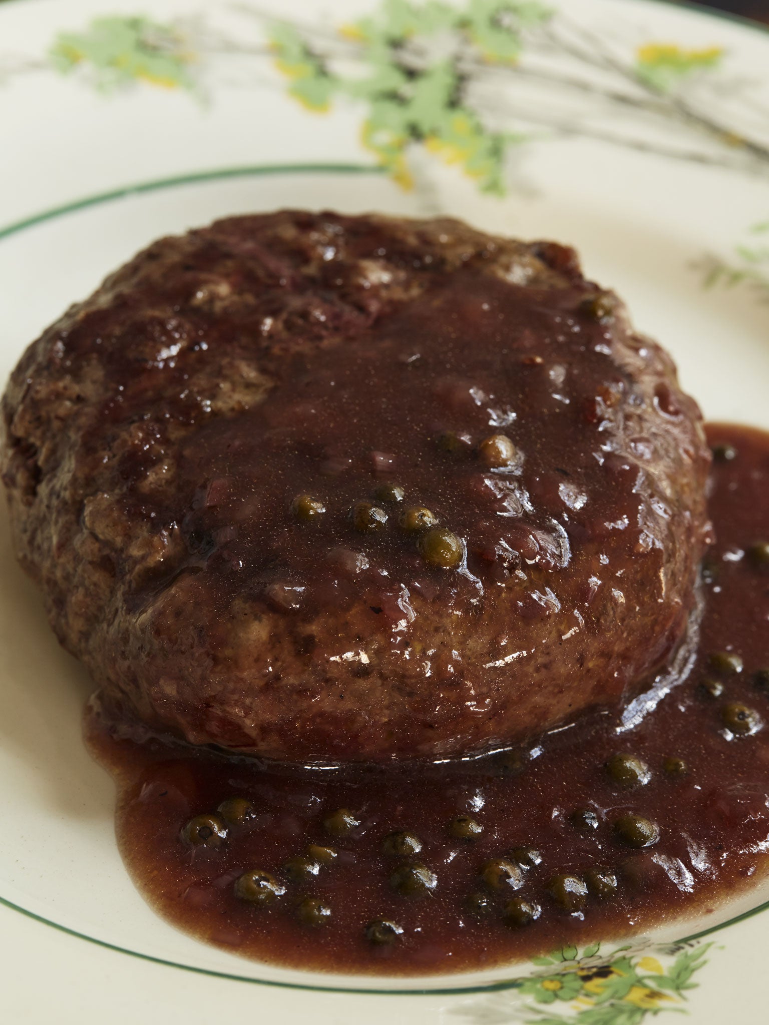 Deer steak burger with green peppercorn sauce