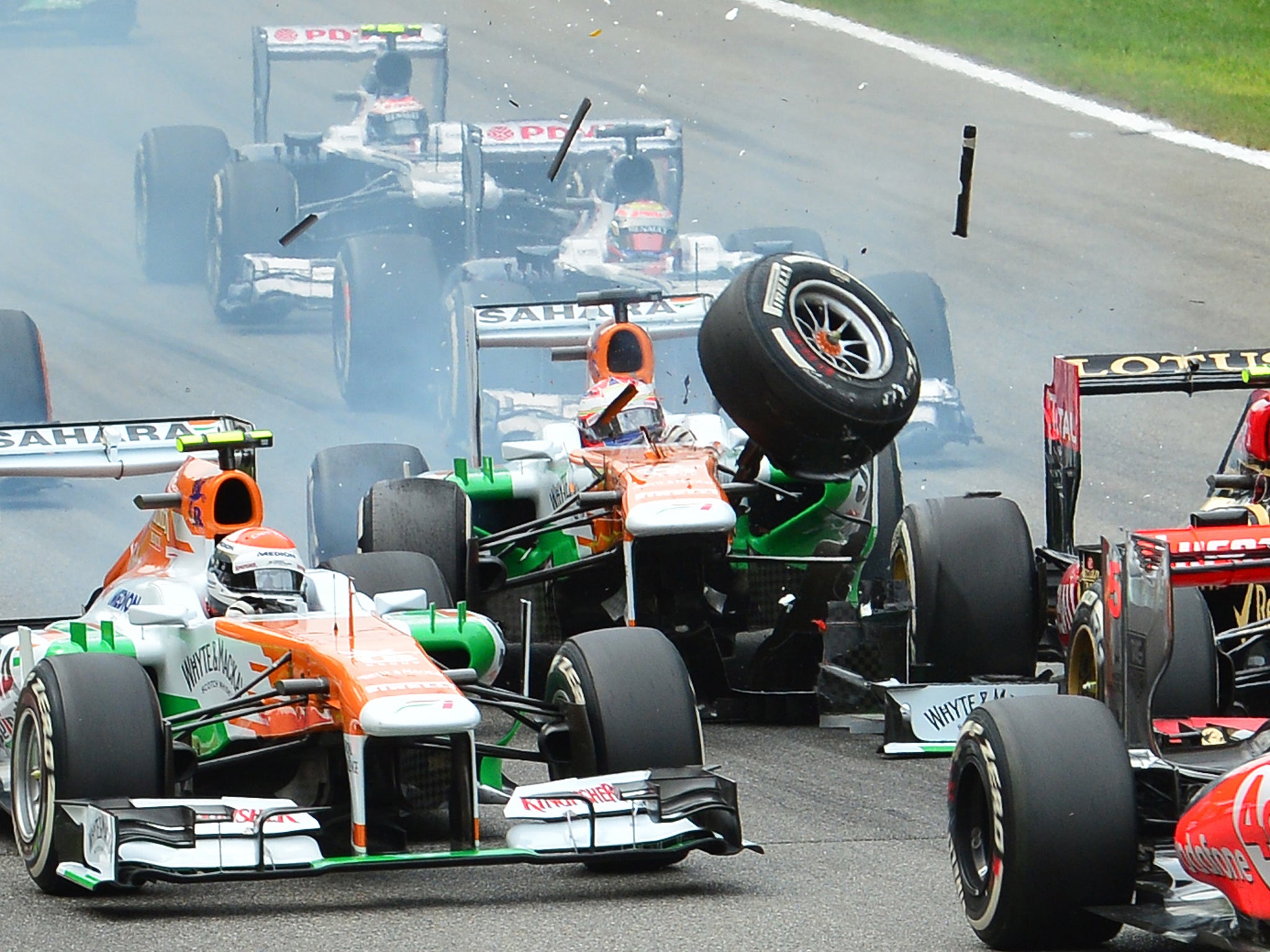 Di Resta crashed into the back of Romain Grosjean, ending his race on lap one