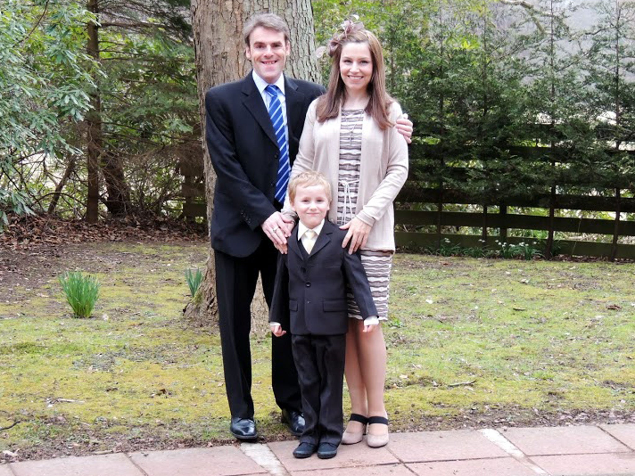 Guy, left, Stacey, right, and Vincent Bailey, centre, are separated until Mr Bailey earns his salary for six months