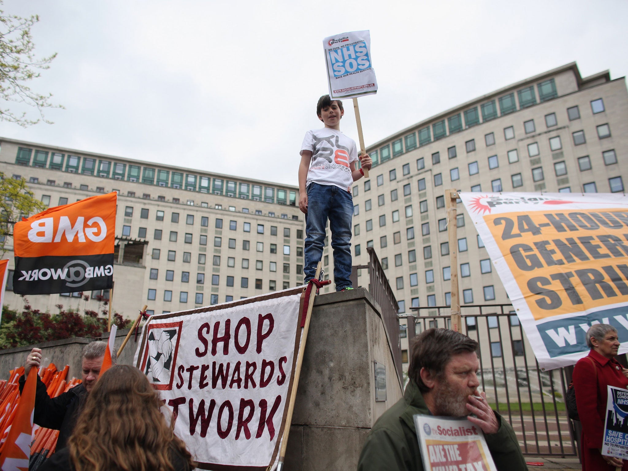 Protestors attend a demonstration against privatisation of the National Health Service on May 18, 2013 in London, England.