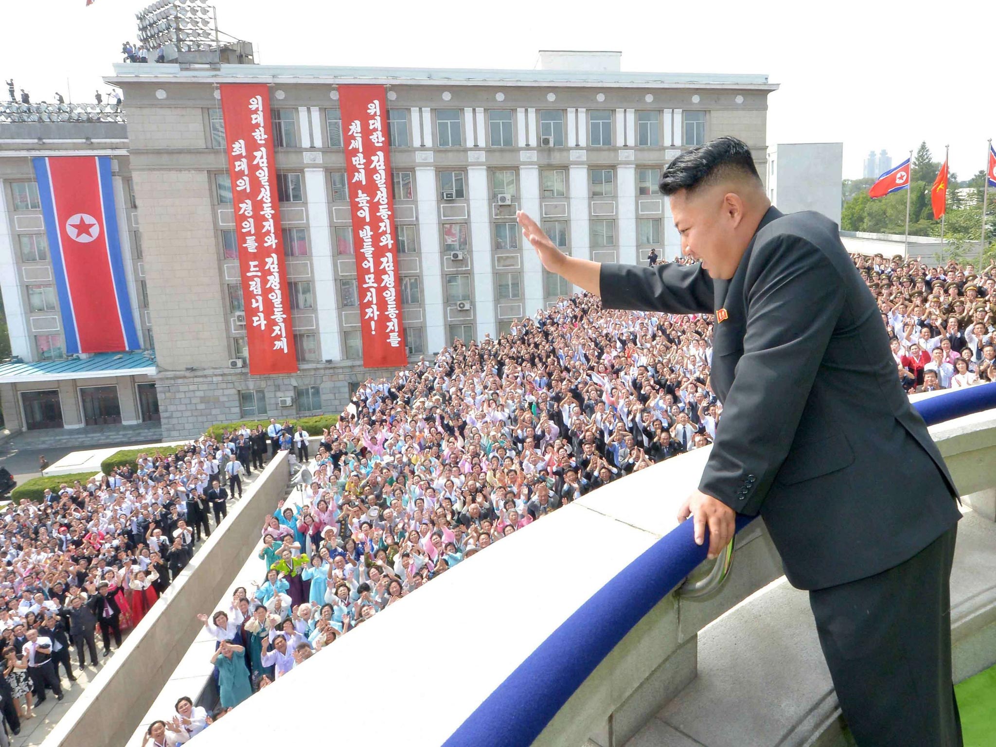 North Korea's leader Kim Jong-un attends a parade of the Worker-Peasant Red Guards and a mass rally in Pyongyang in celebration of the 65th anniversary of North Korea