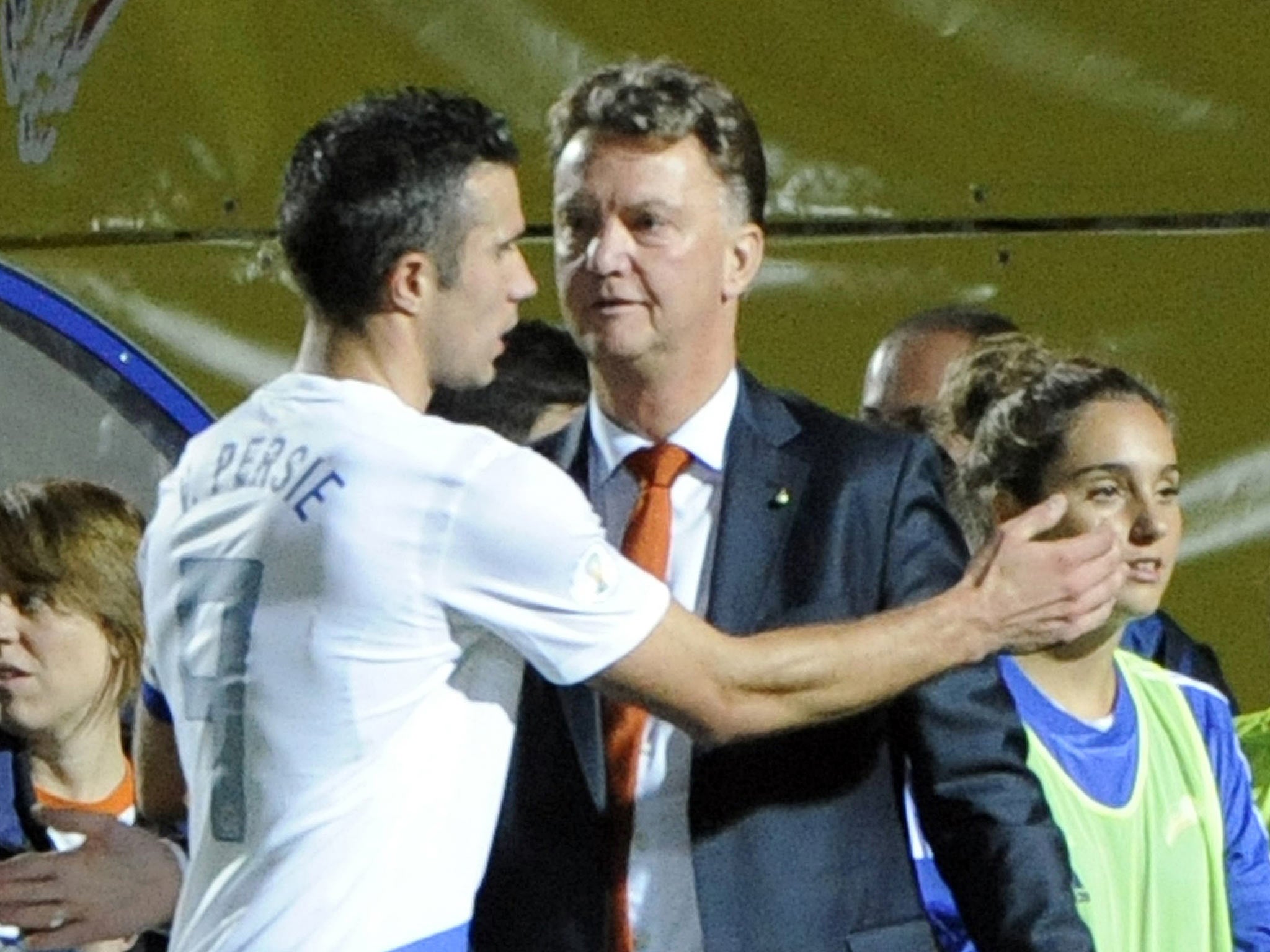 Netherlands coach Louis Van Gaal (R) is congratulated by forward Robin Van Persie (L) after their team defeated Andorra