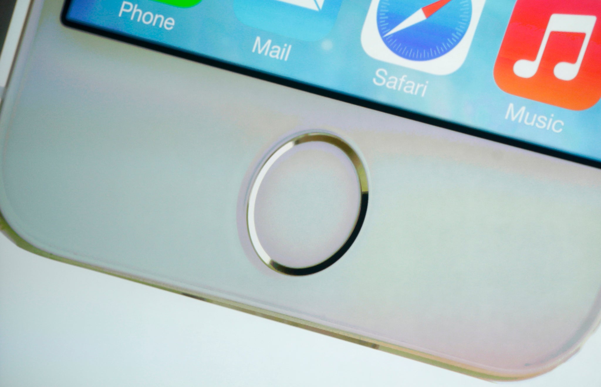 The fingerprint sensor sits invisible behind the iPhone's home button proving that Apple, at least, can make biometrics feel unobtrusive.