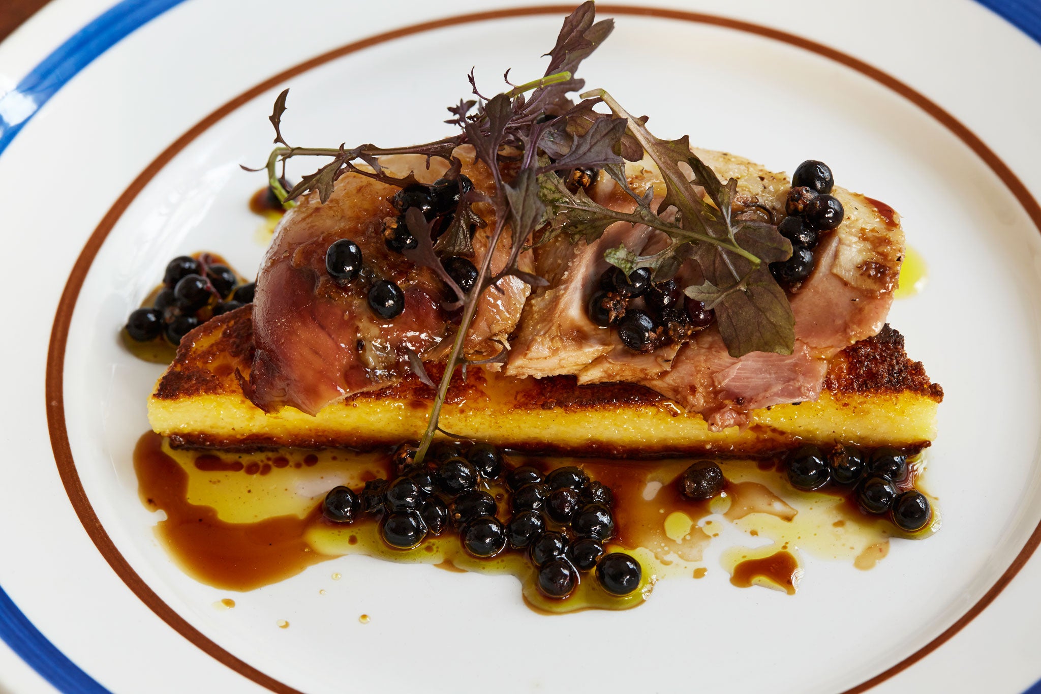 Partridge with polenta and elderberries