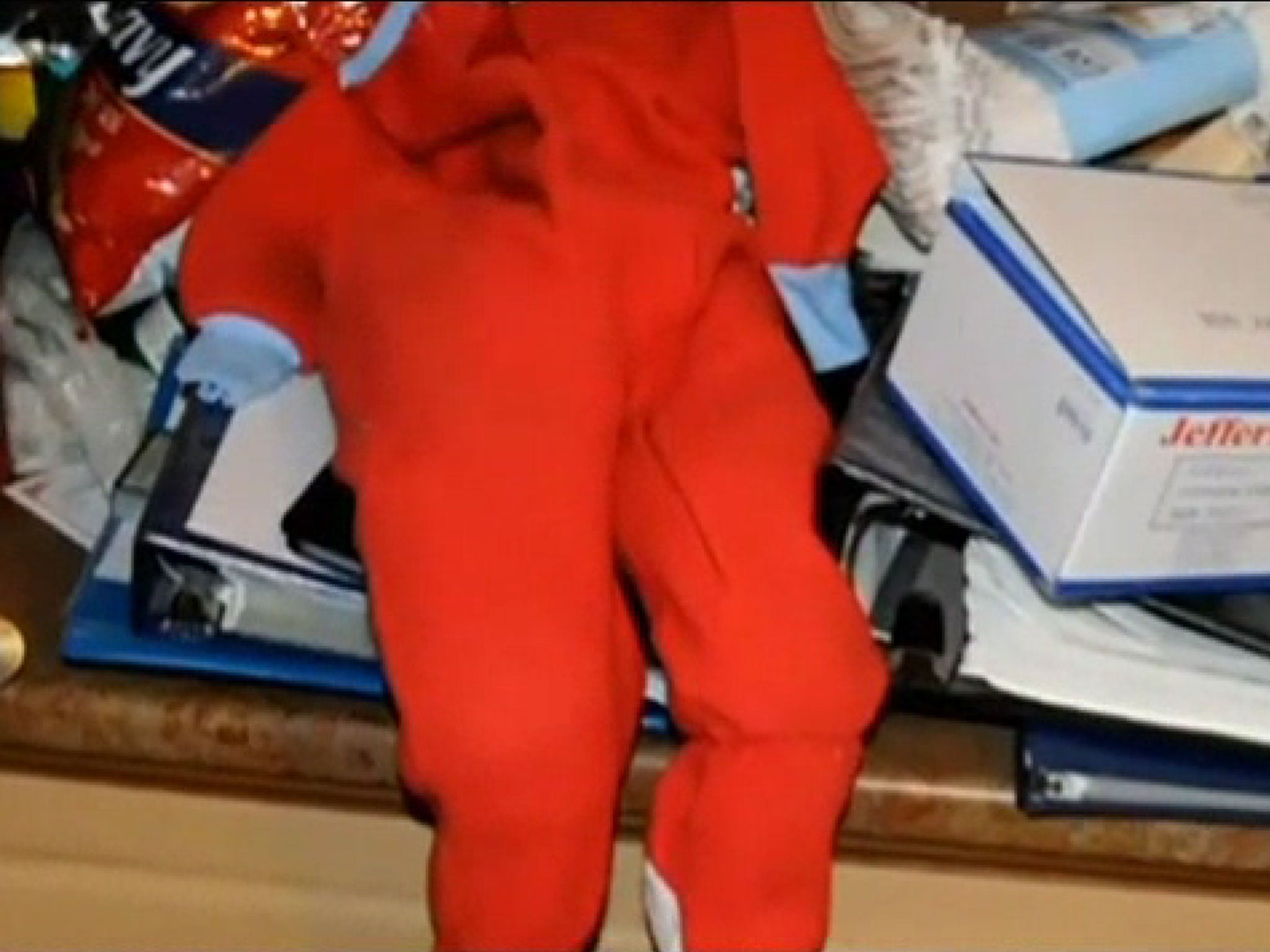 A child sized orange jump suit was also discovered in Portway's dungeon