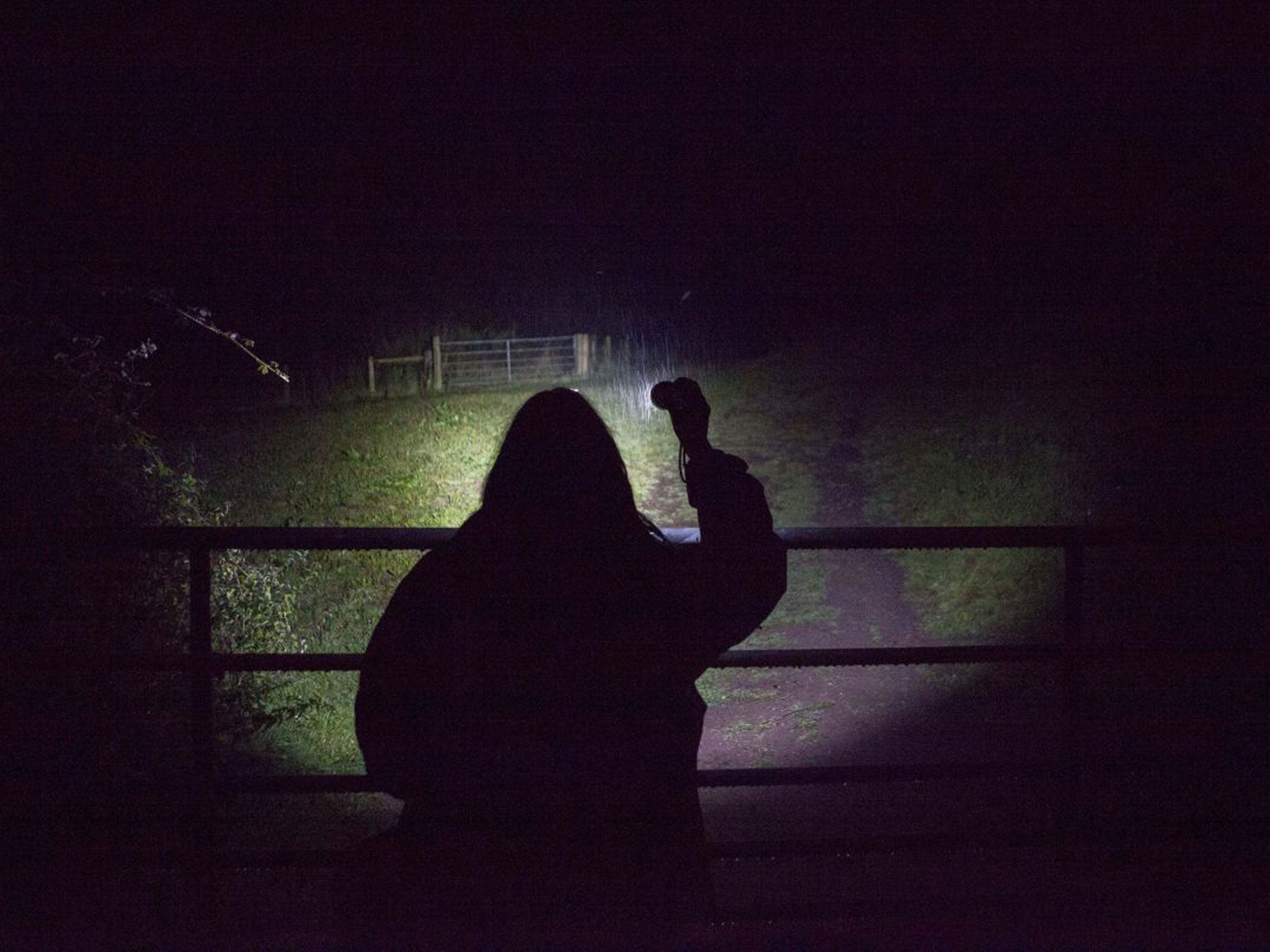 A member of the Somerset Badger Patrol checks areas inside the cull zone in Williton