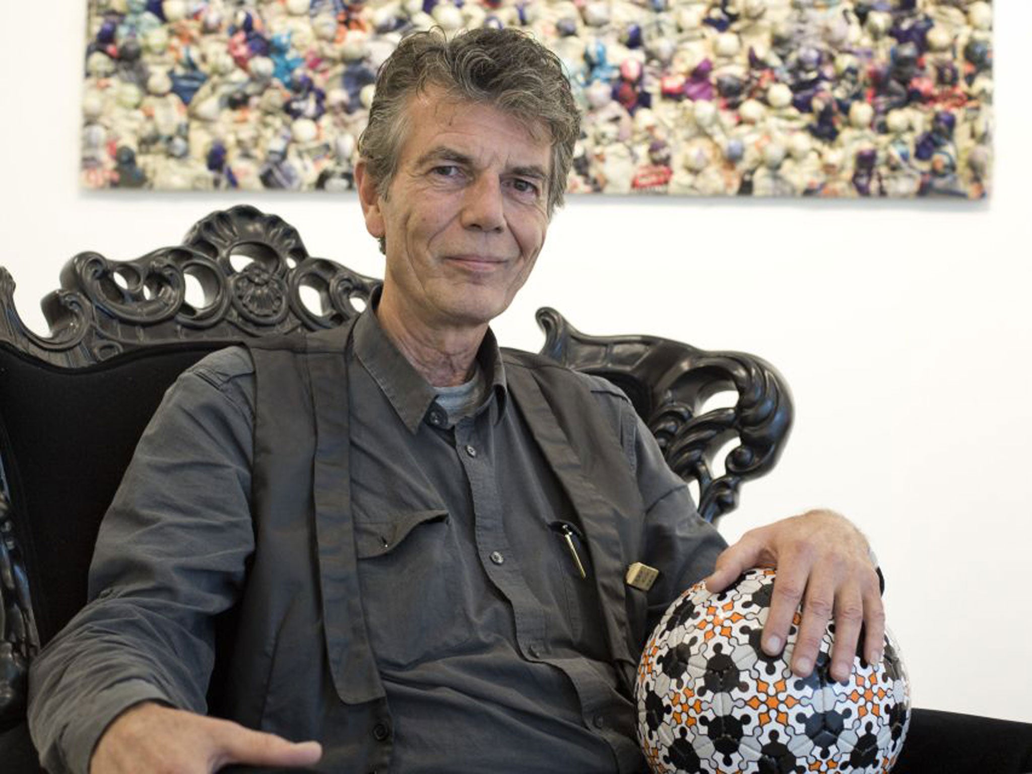 Bob van Persie with his Persie Ball, 2010 and one of his pictures at the Richard Goodall Gallery in Manchester