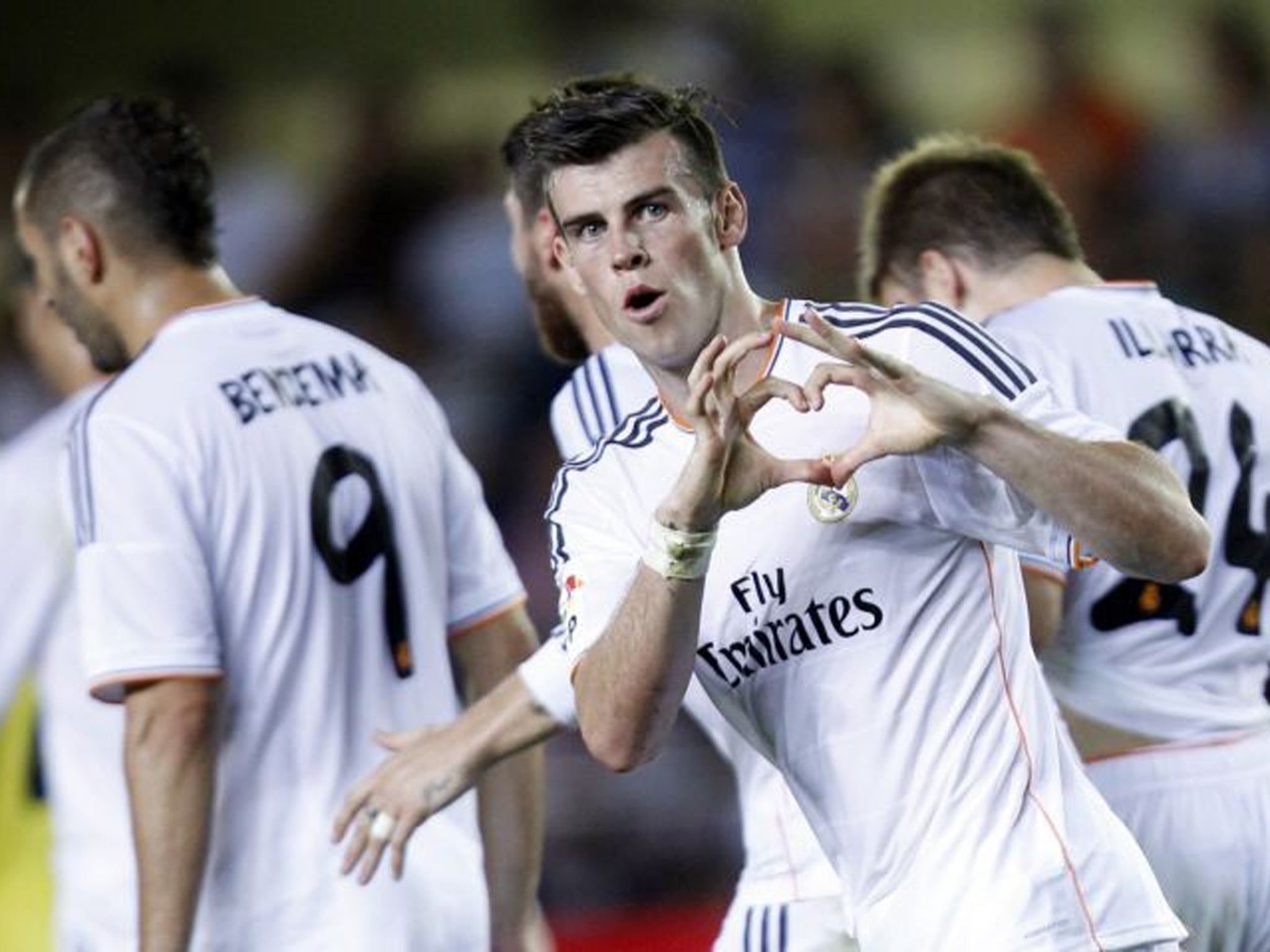 Gareth Bale celebrates his goal on his Real Madrid debut