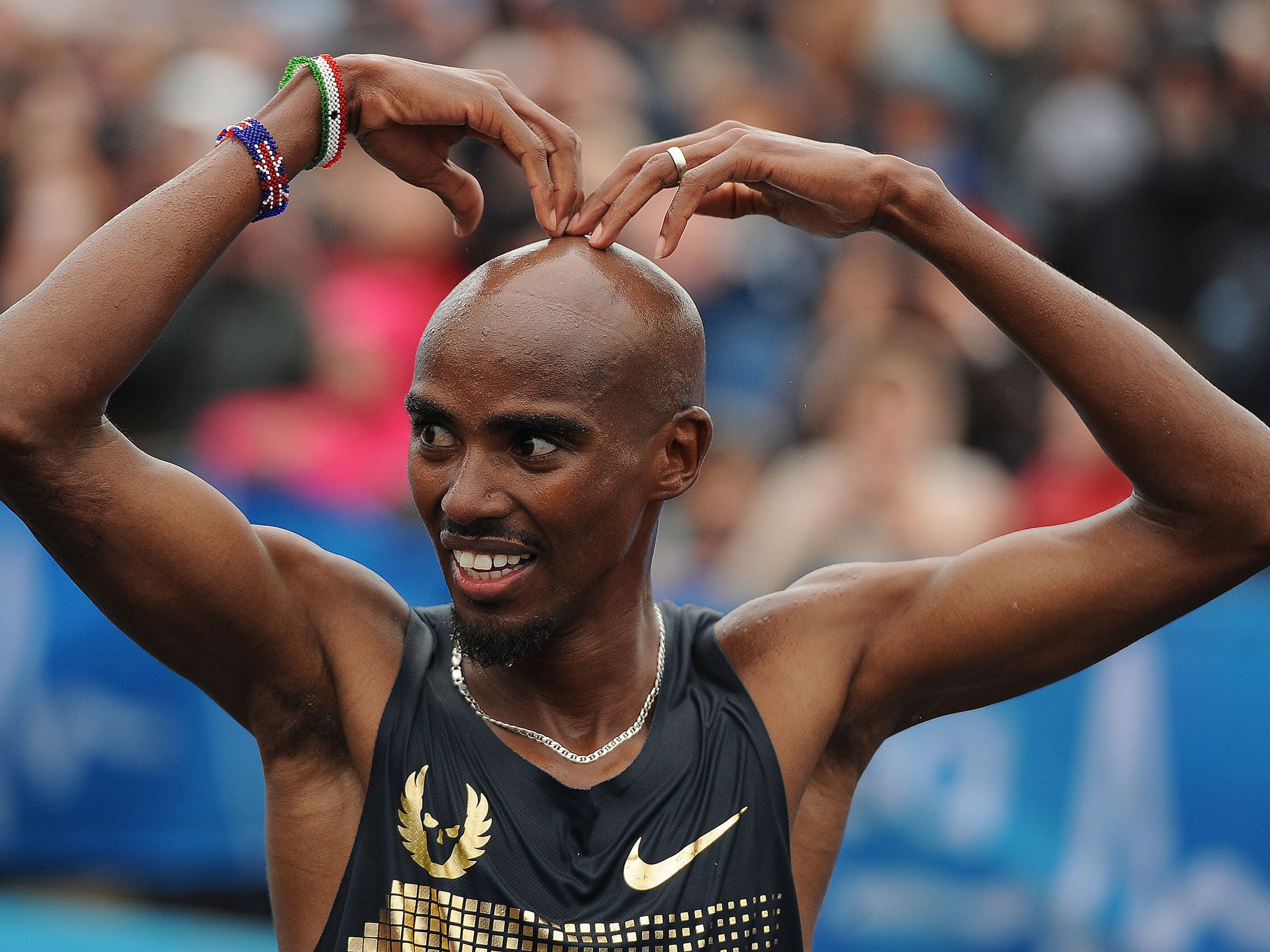 Mo Farah reacts after finishing second