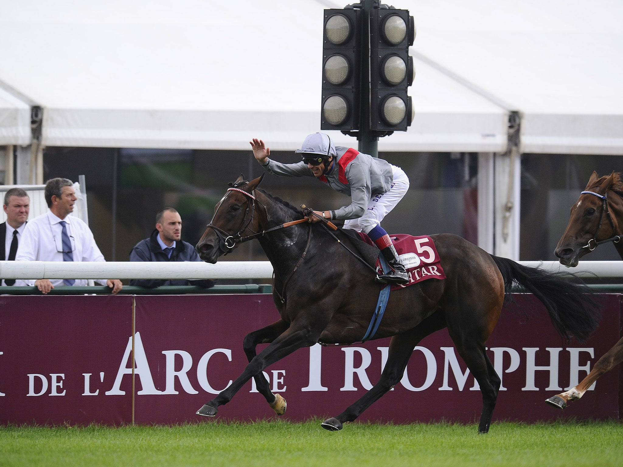 Frankie Dettori pats the Prix Vermeille winner Treve in celebration