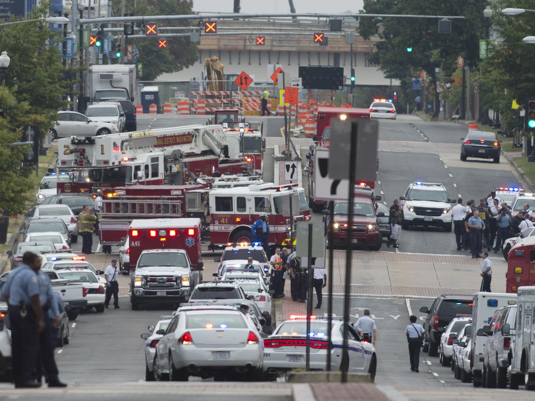 Police and firefighters respond to the report of a shooting at the Navy Yard in Washington DC