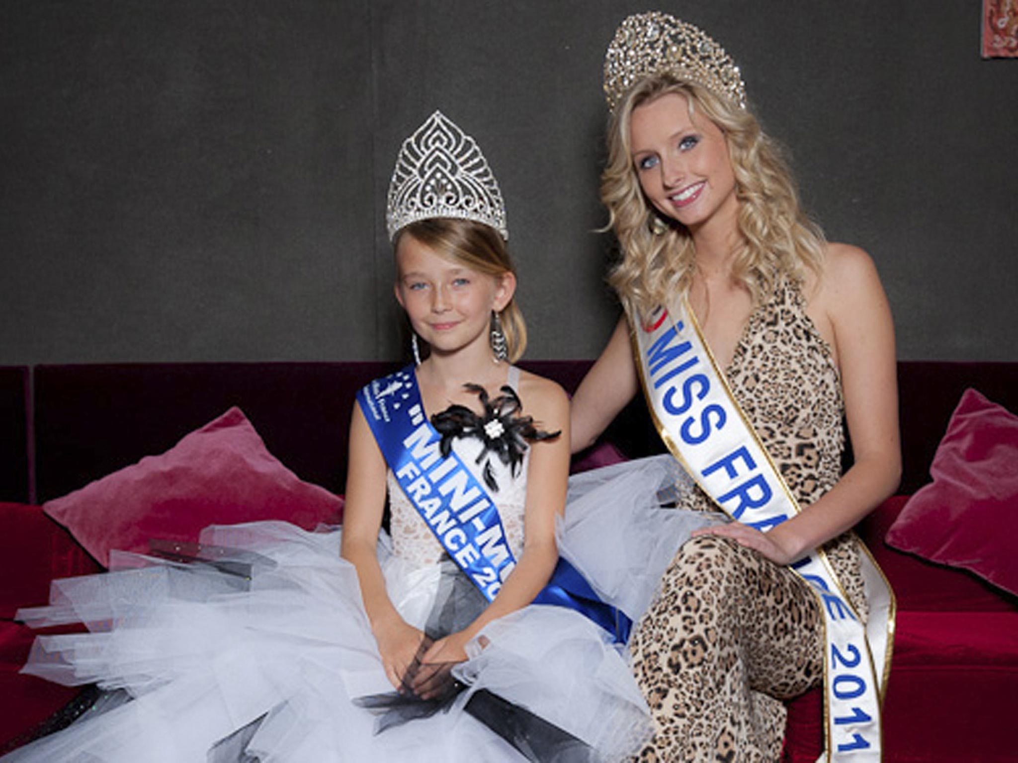 Oceane Scharre, 10, elected Mini Miss France 2011 (left) and Miss France 2011 Mathilde Florin. France's Senate has voted to ban beauty pageants for children under 16, in an effort to protect children, especially girls from being sexualized too early.