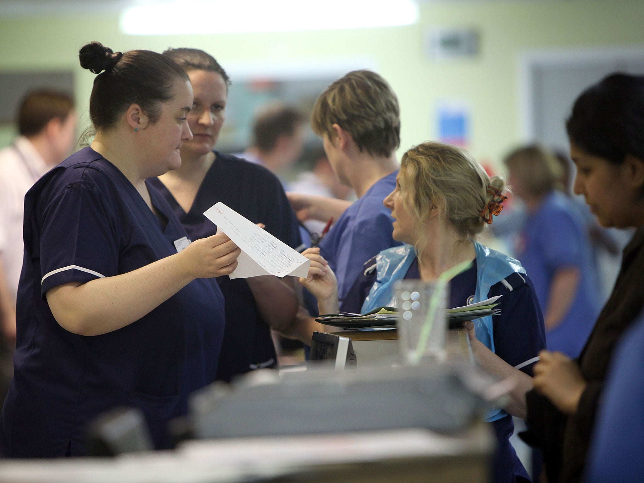 Nurses in the accident and emergency dept of Selly Oak Hospital work during a busy shift on March 16, 2010 in Birmingham, England