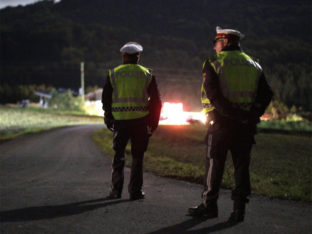 Police secure the property of the suspect in Grosspriel, Austria