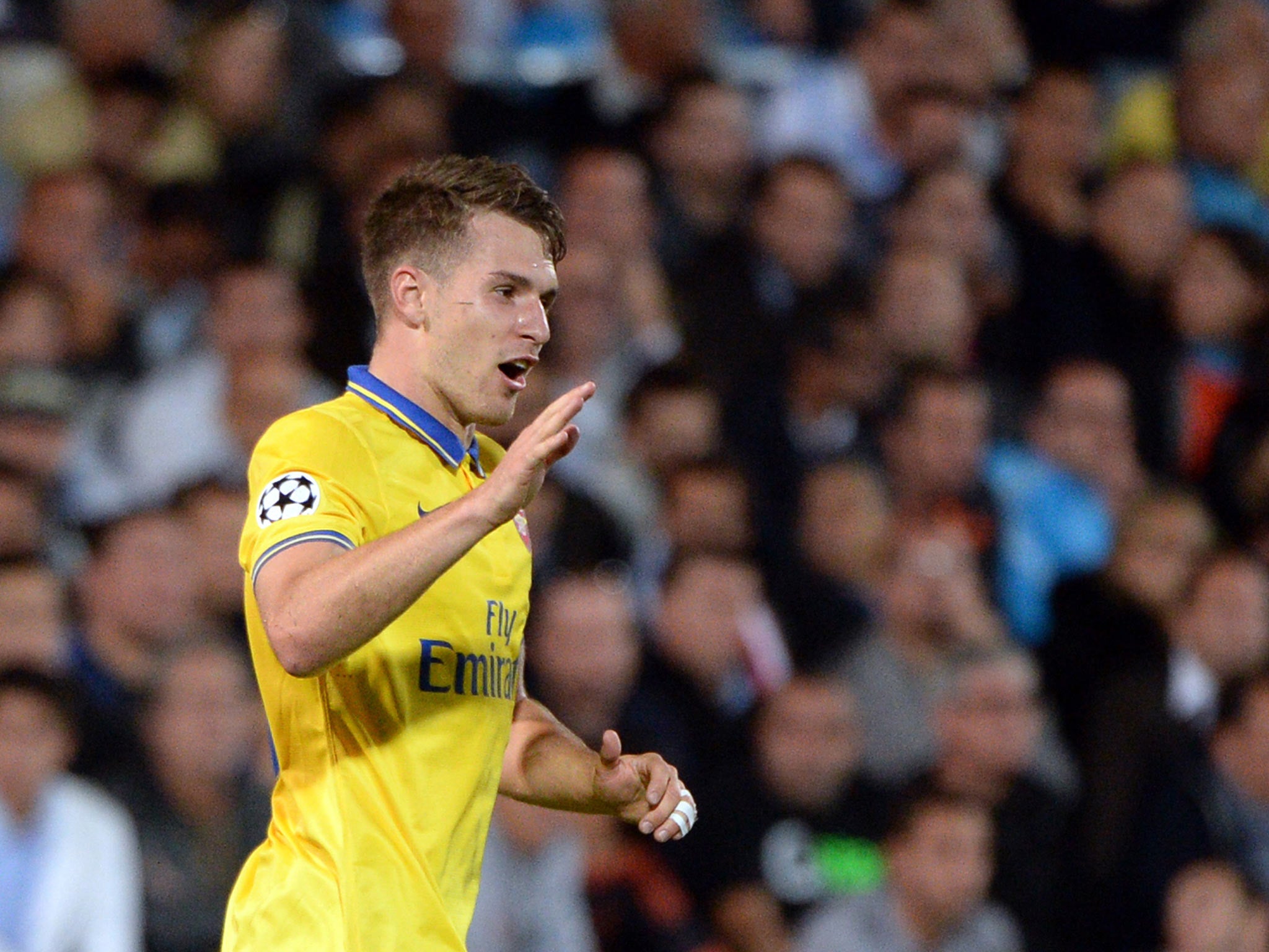 Aaron Ramsey celebrates his goal for Arsenal against Marseille