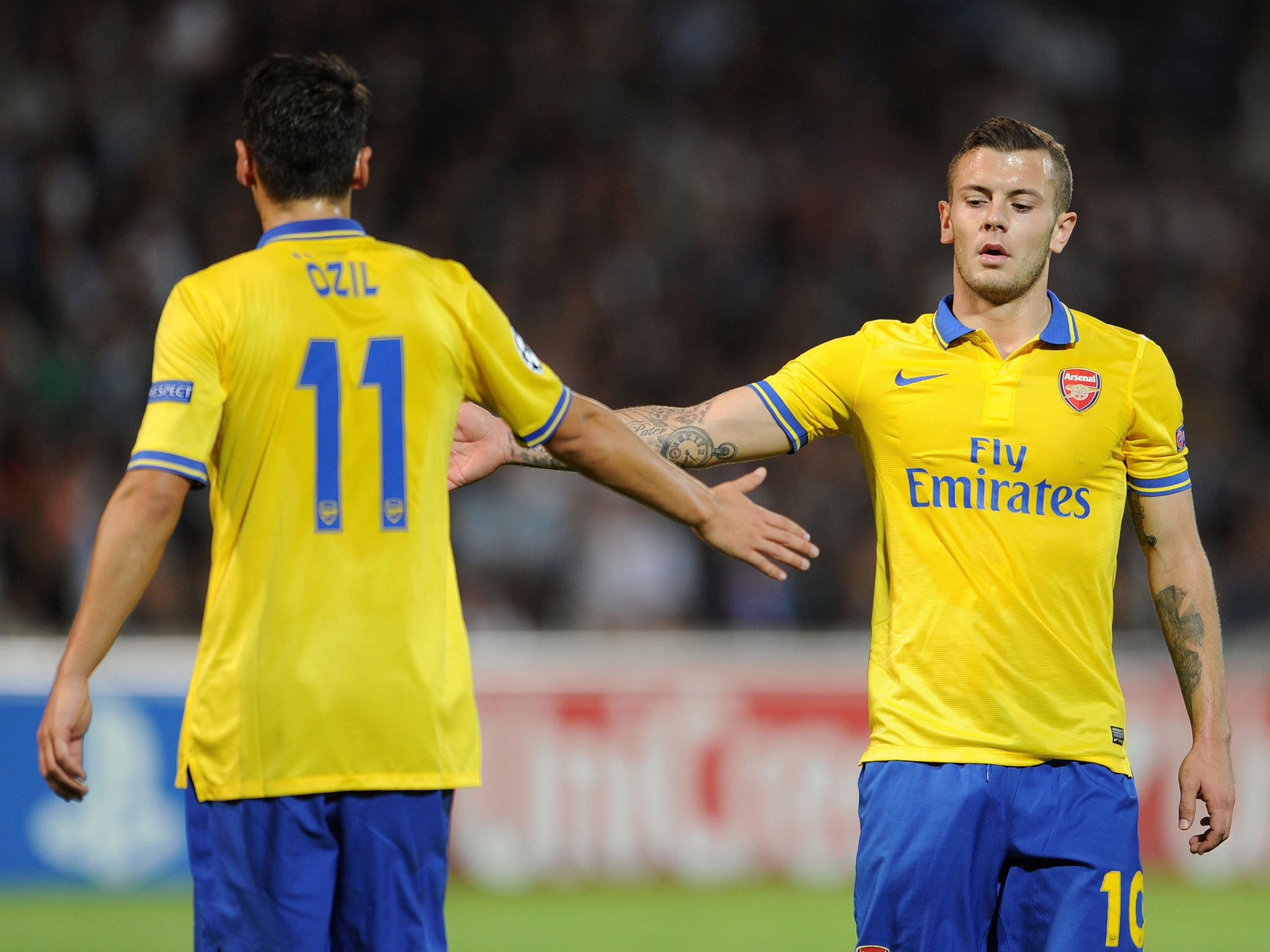 Jack Wilshere with Mesut Ozil