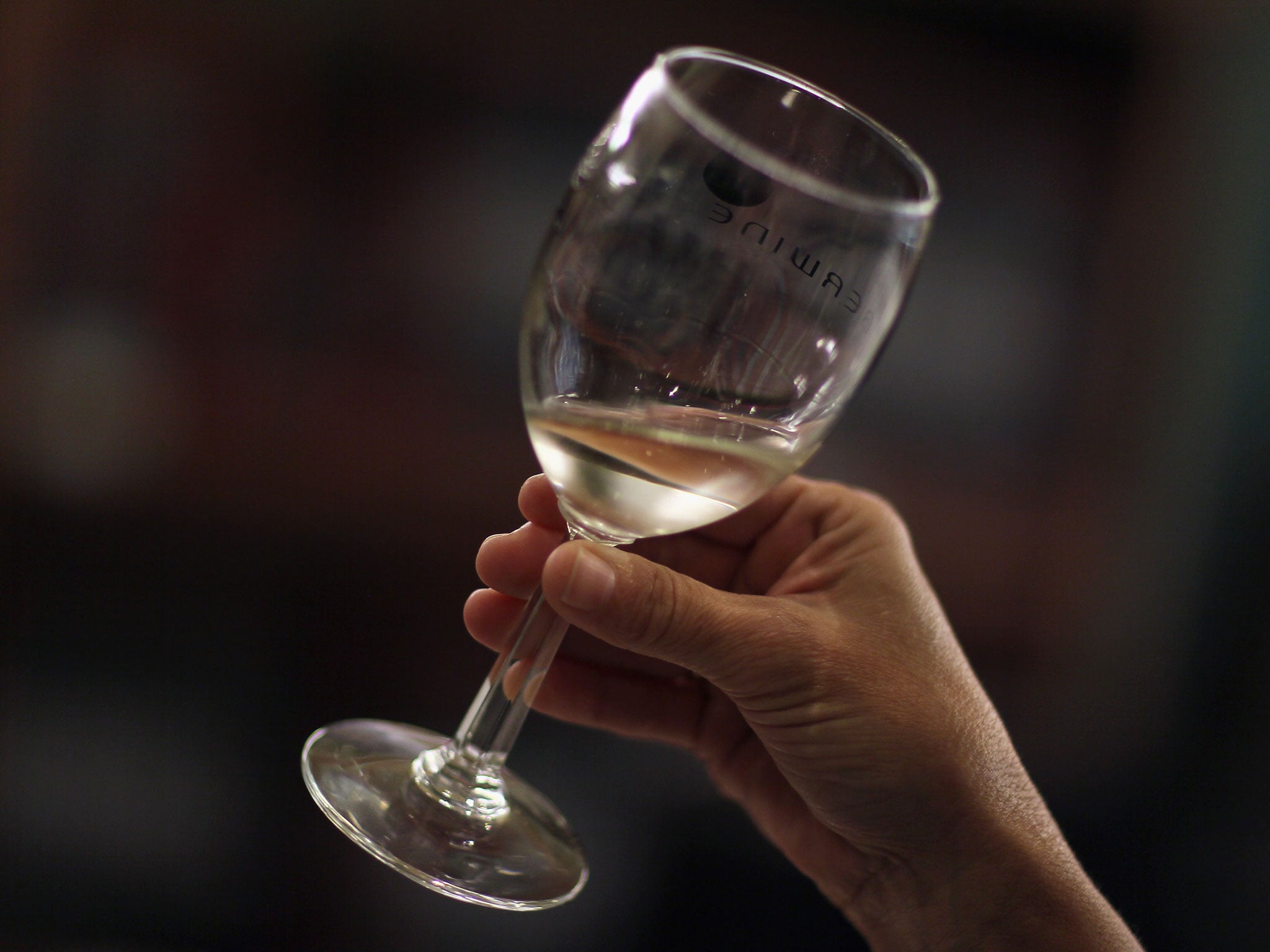 Monica De Abreu tastes a white wine, 2011 in Miami, Florida.