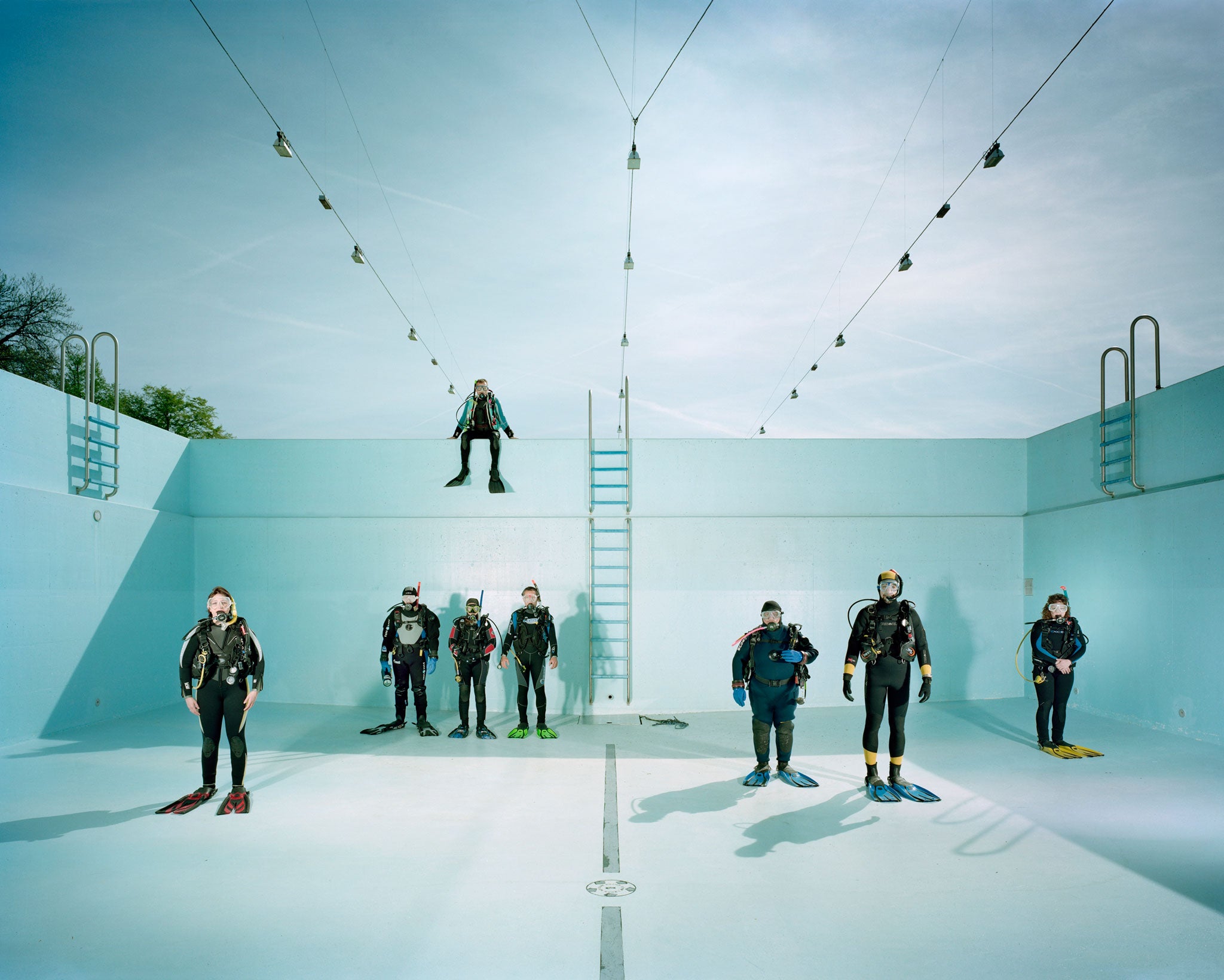 In a the deep end: The Dintefisch ('Squid') Diving Club's 48 members meet once a week in a local pool to hone their techniques and plan their annual diving getaway, in the Azores