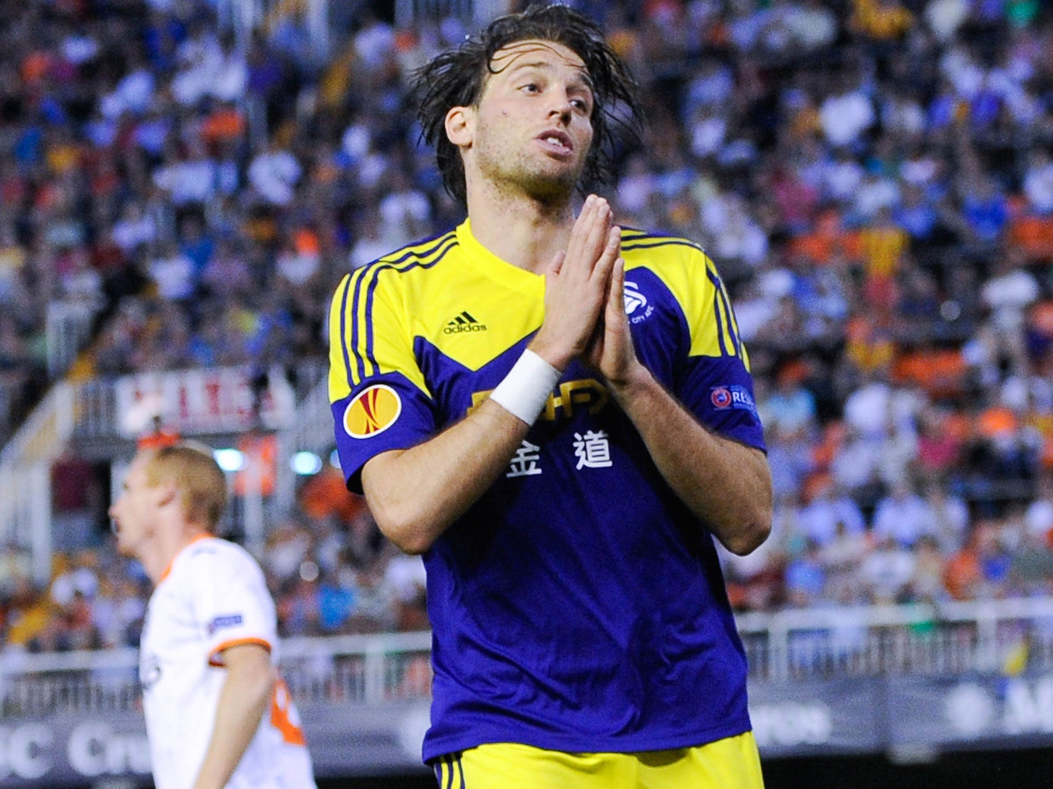 Swansea's Michu celebrates after scoring at the Mestalla