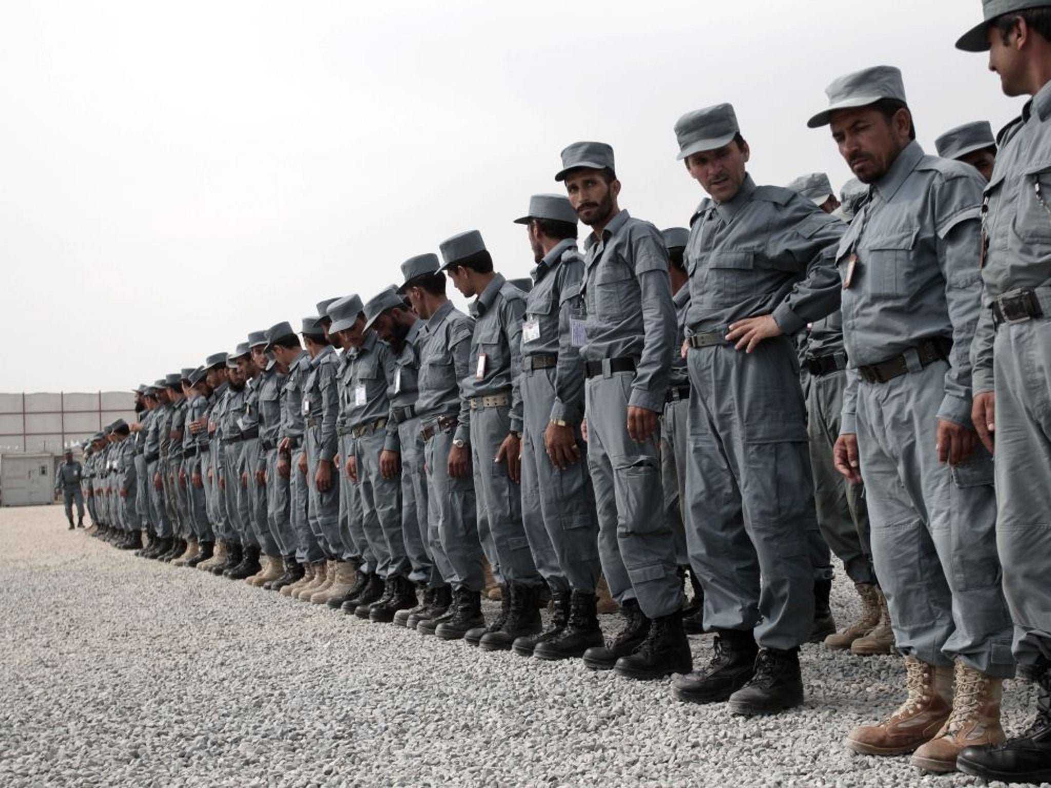 Officers at an Afghan police training centre. A Taliban ambush in the remote region of Badakhshan killed 18 and wounded 13 other servicemen this week, renewing concerns about the country's ability to cope without Nato support