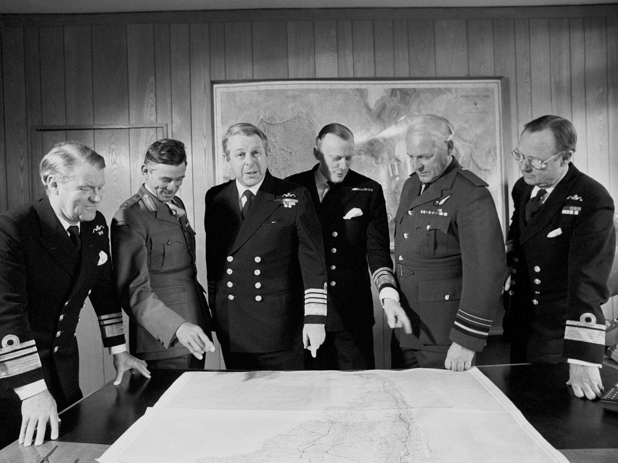 Curtiss (above, second from right) with other service chiefs during the Falklands war