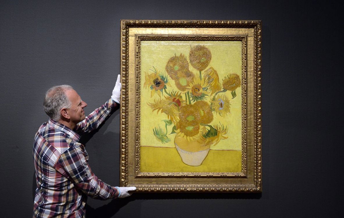 Hanging Van Gogh's Sunflowers in the Van Gogh Museum in Amsterdam this year