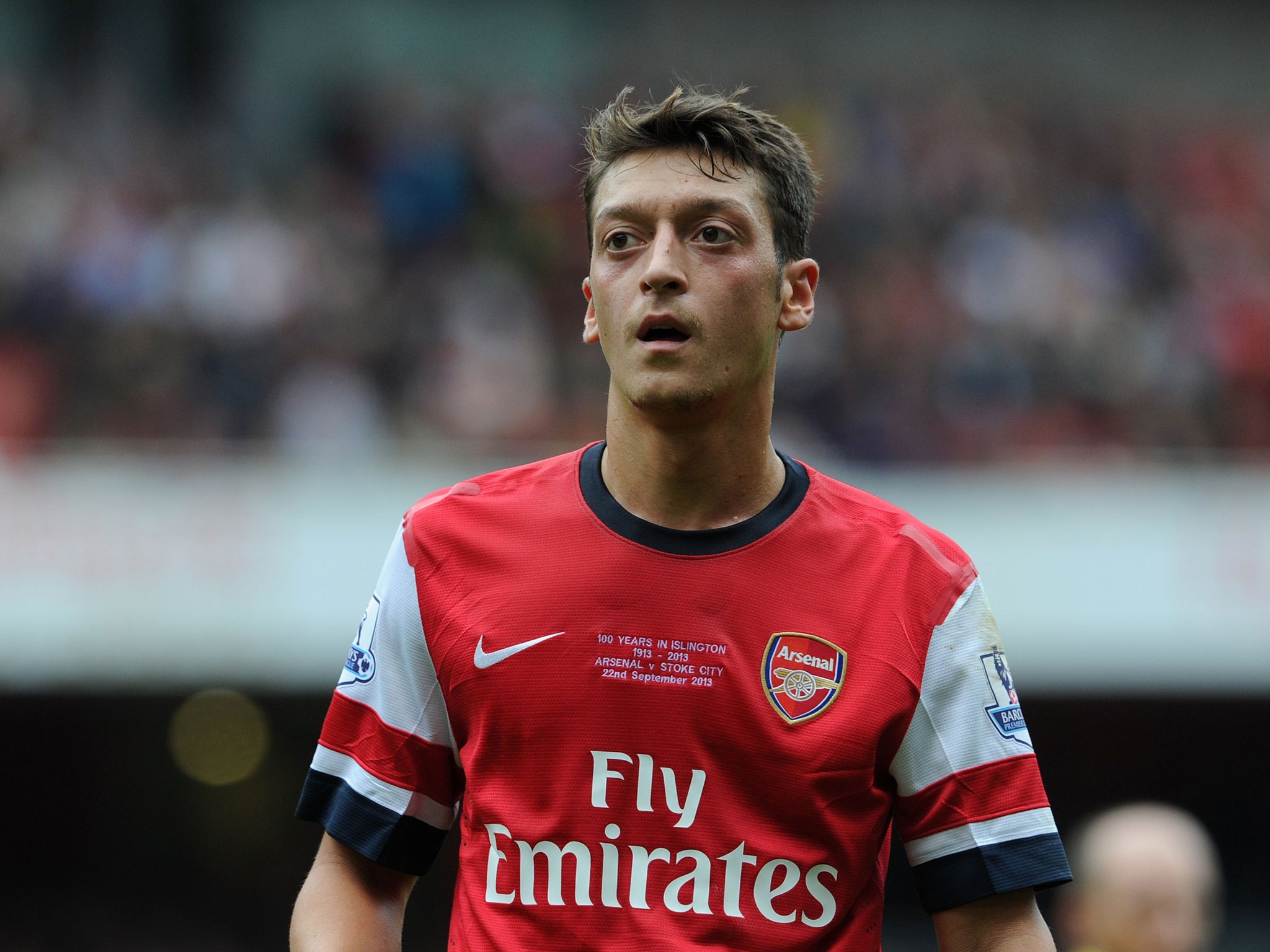 Arsene Wenger has praised midfielder Mesut Ozil for his performance against Stoke