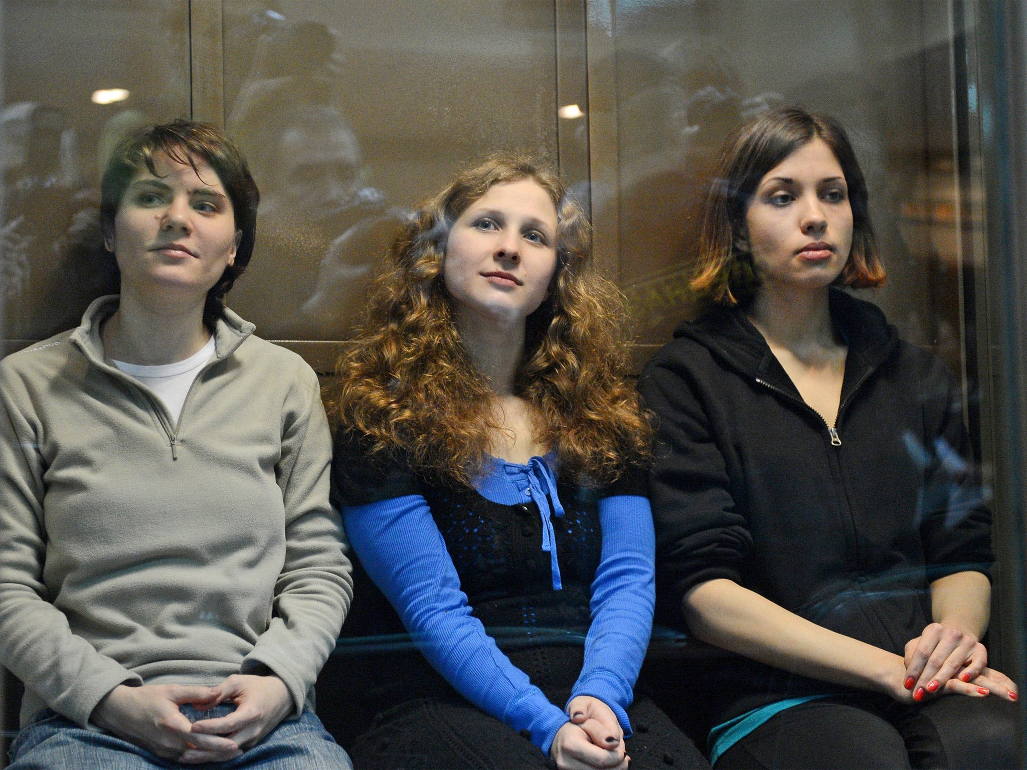 Tolokonnikova (right) and fellow Pussy Riot members Yekaterina Samutsevich (left) and Maria Alyokhina (Getty)