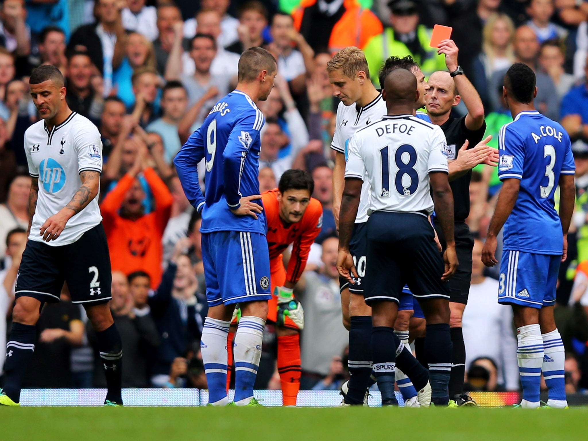 Fernando Torres is sent-off after receiving a second yellow card