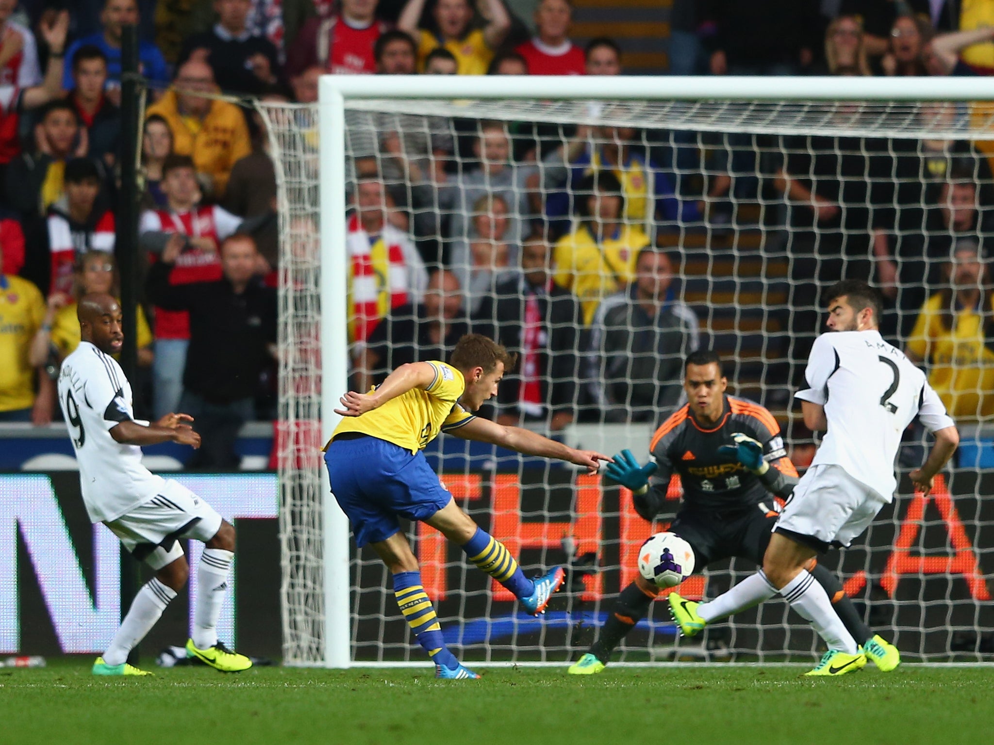 Aaron Ramsey scores for Arsenal against Swansea