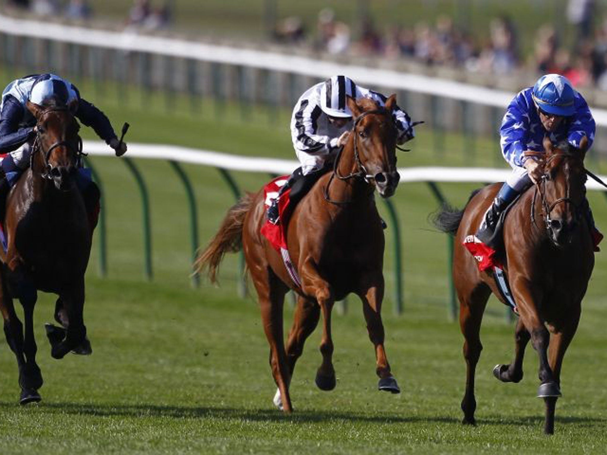 Vorda va va voom: Olivier Peslier (far right) guides the French challenger home in the Group One Cheveley Park Stakes at Newmarket yesterday