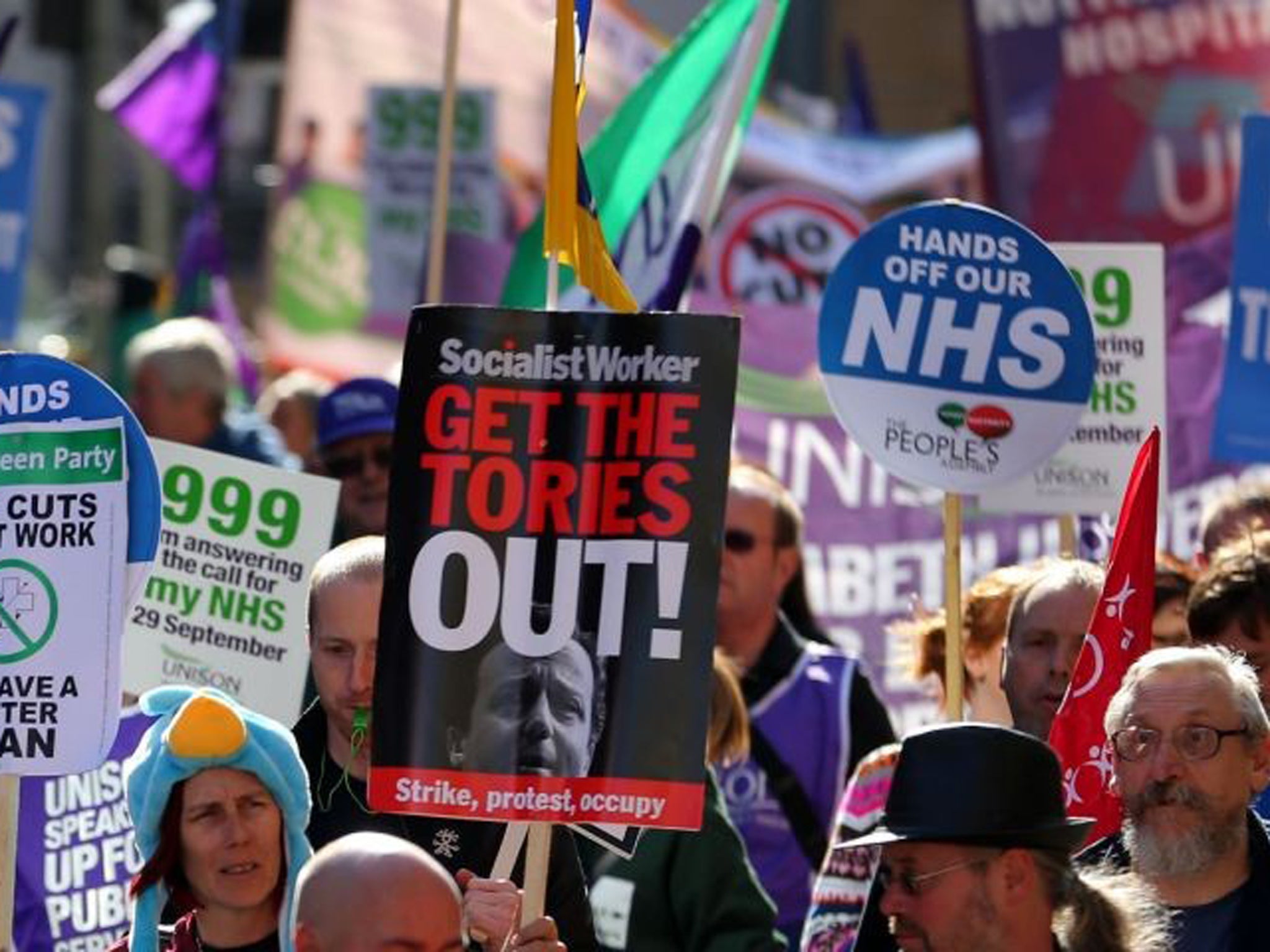 Protesters march through Manchester on a union protest against austerity cuts