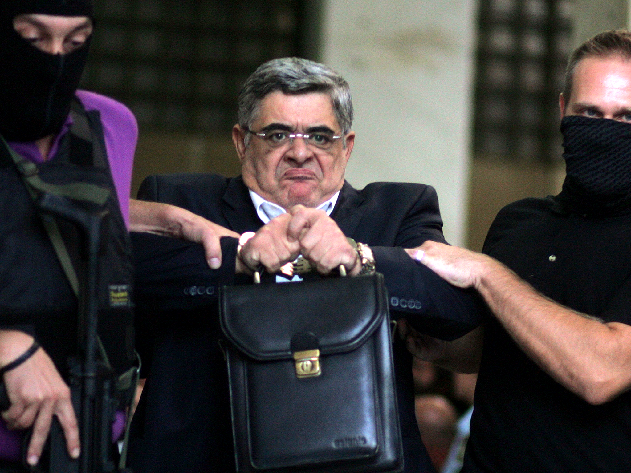 Golden Dawn leader Nikos Michaloliakos, during his arrest in September 2013