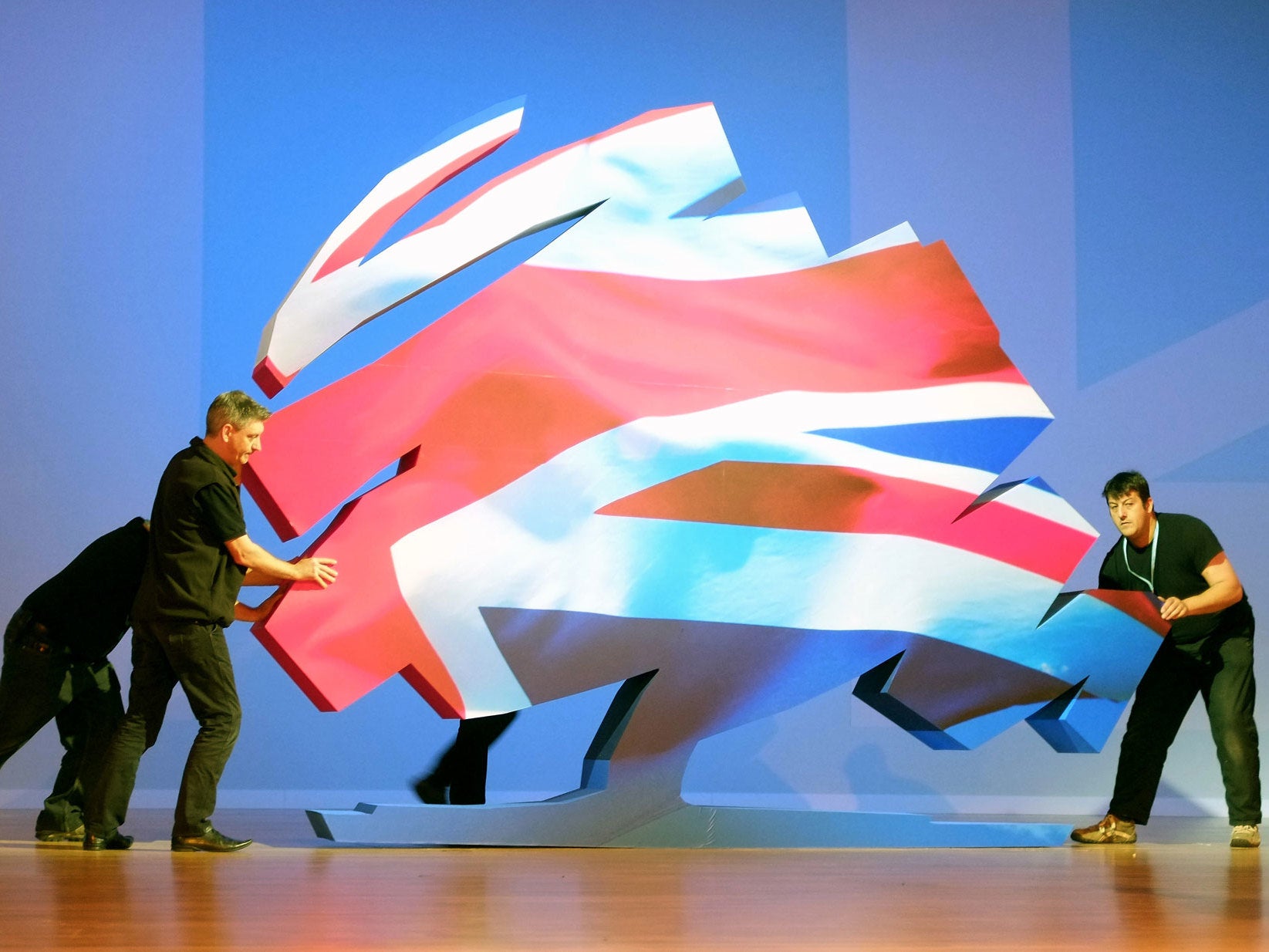 The Conservative Party logo is re-positioned ahead of speech by David Cameron