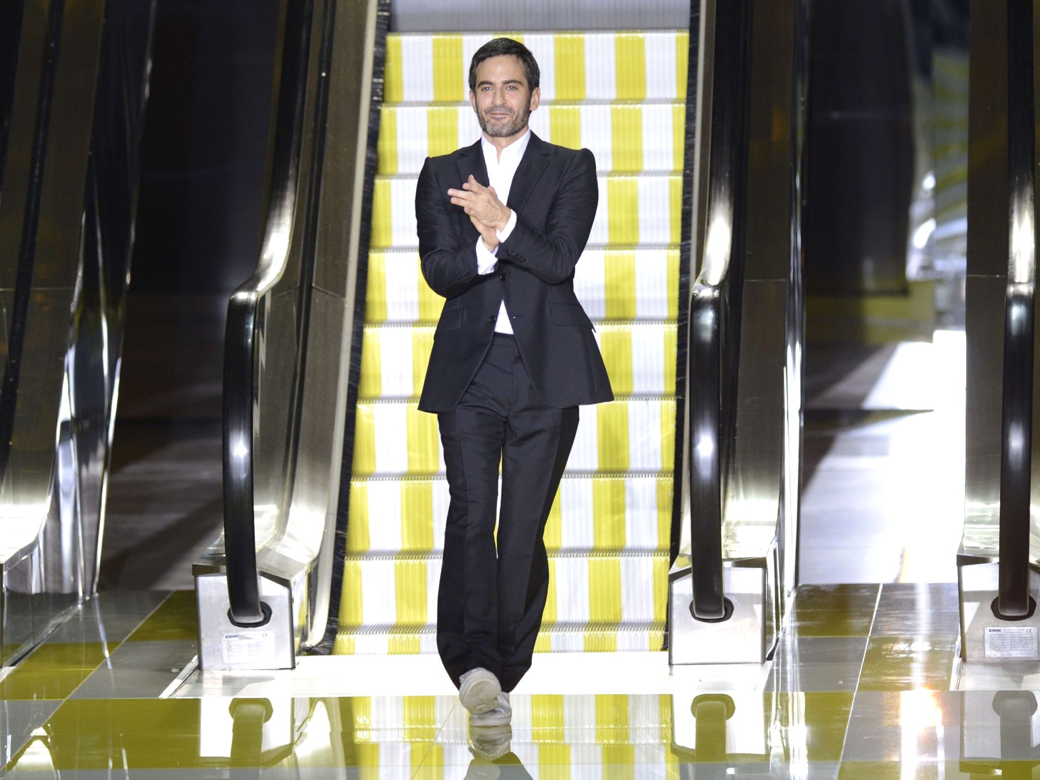 Marc Jacobs acknowledging the public at the end of his Spring/Summer 2013 ready-to-wear collection for Louis Vuitton in Paris