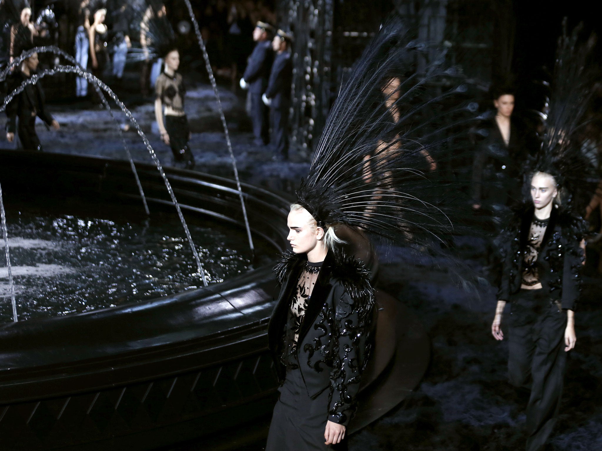 Models walk for the Louis Vuitton Spring Summer 2014 collection