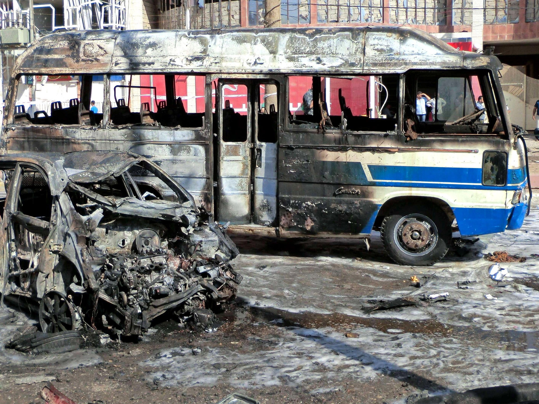 Aftermath of a car bombing in Kirkuk, northern Iraq, on Wednesday