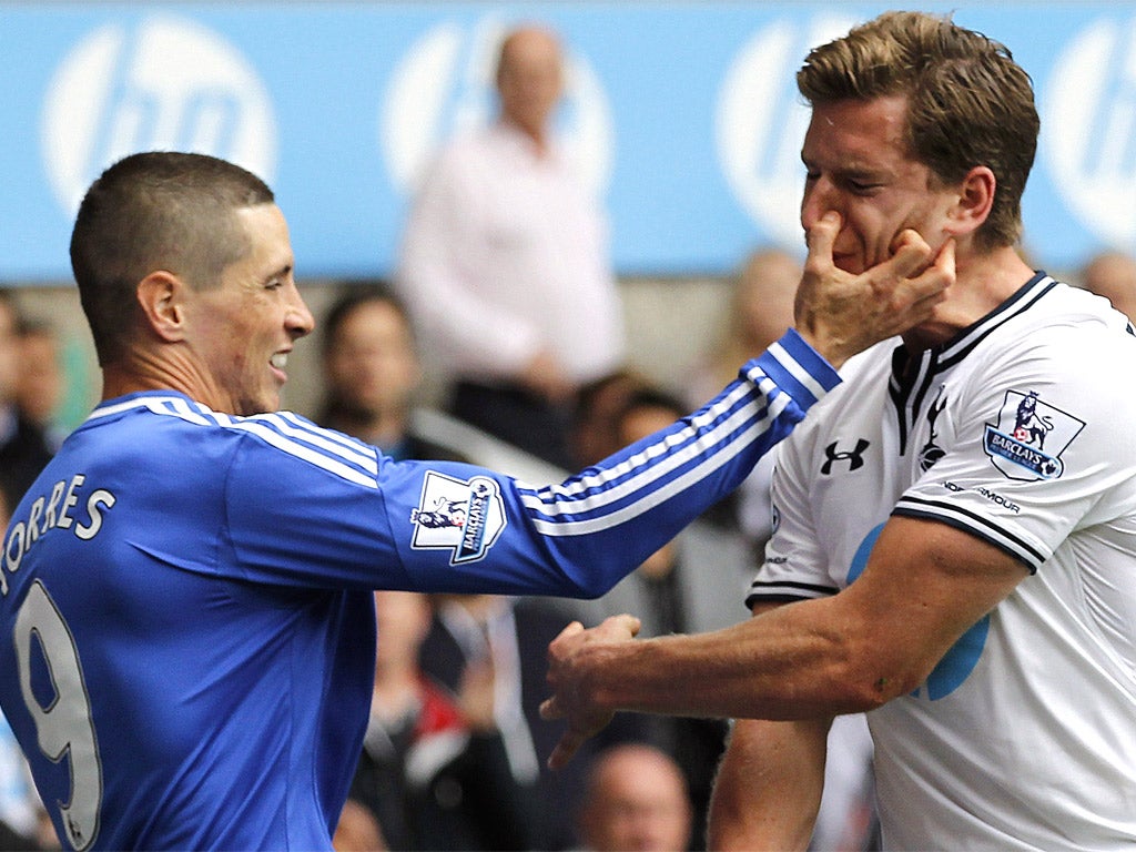 Torres received a yellow card for scratching Vertonghen