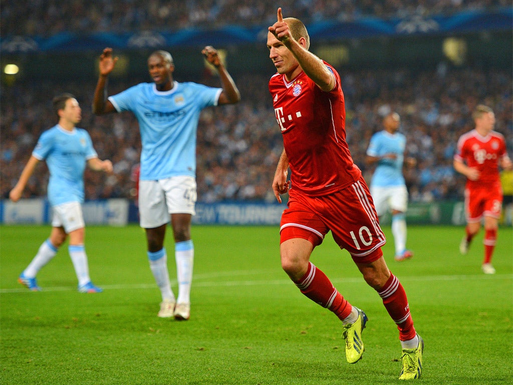 Arjen Robben celebrates Bayern Munich's third goal